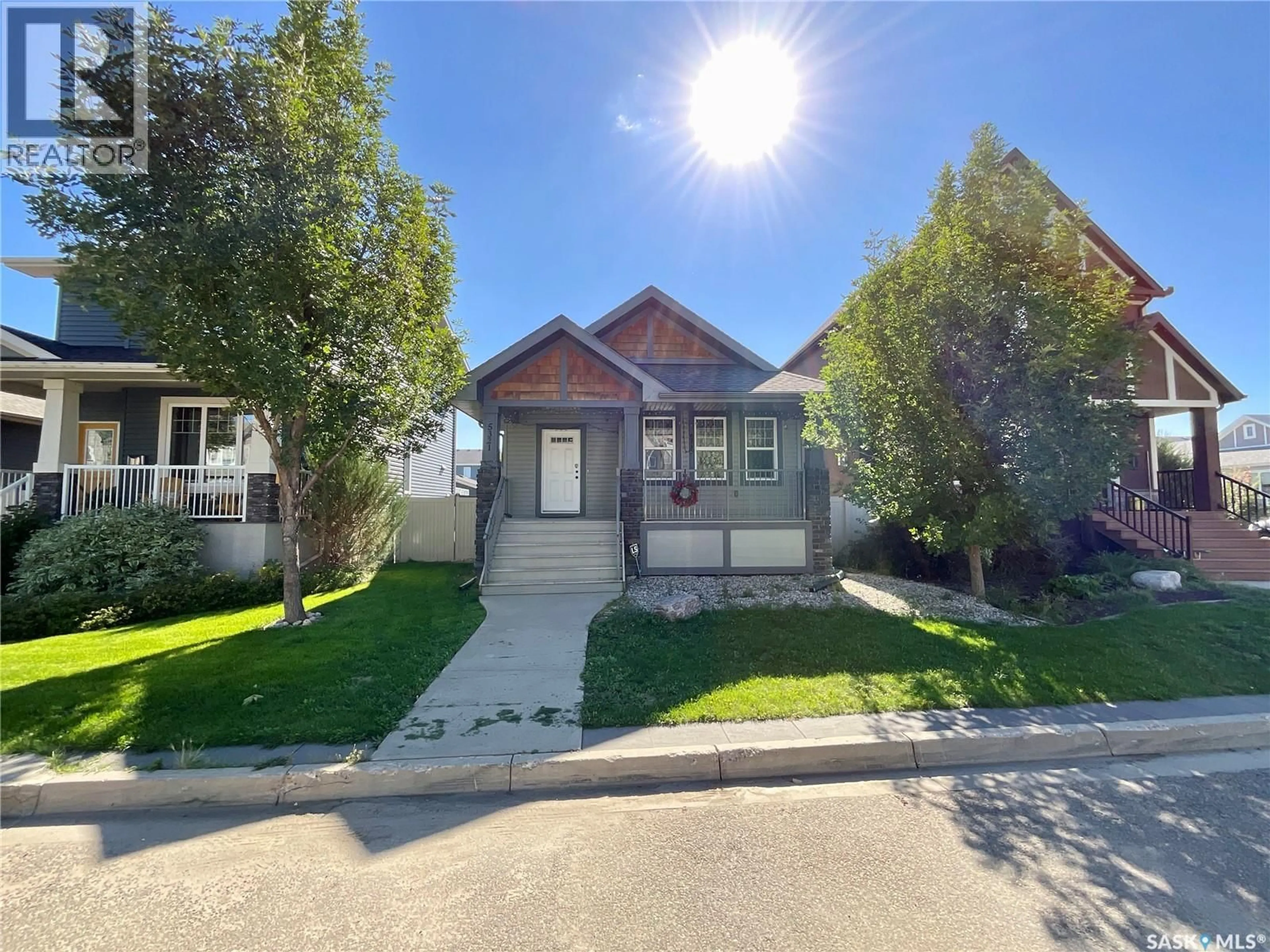 Home with vinyl exterior material, street for 5321 MITCHINSON WAY, Regina Saskatchewan S4W0G8