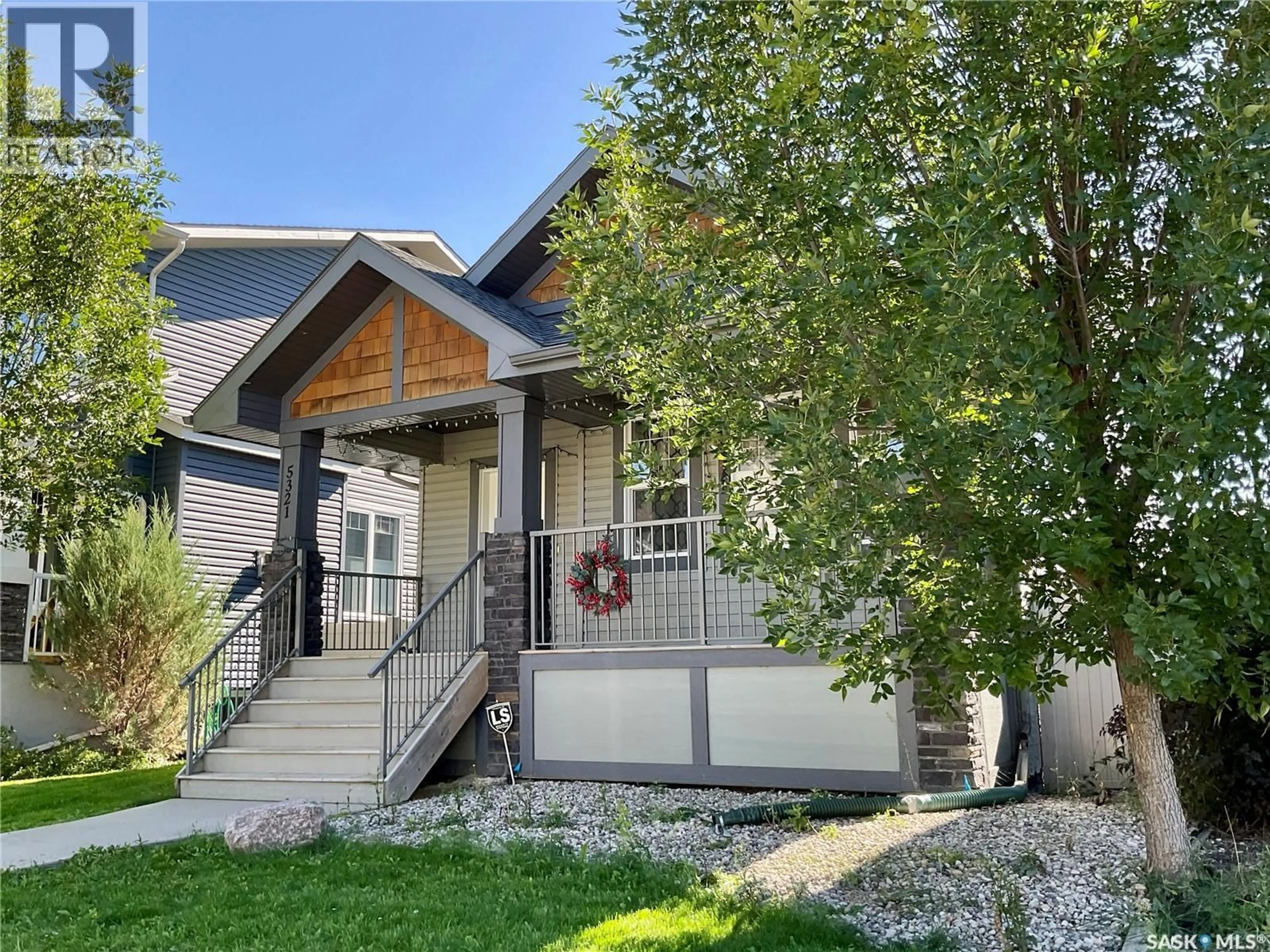 Home with vinyl exterior material, street for 5321 MITCHINSON WAY, Regina Saskatchewan S4W0G8