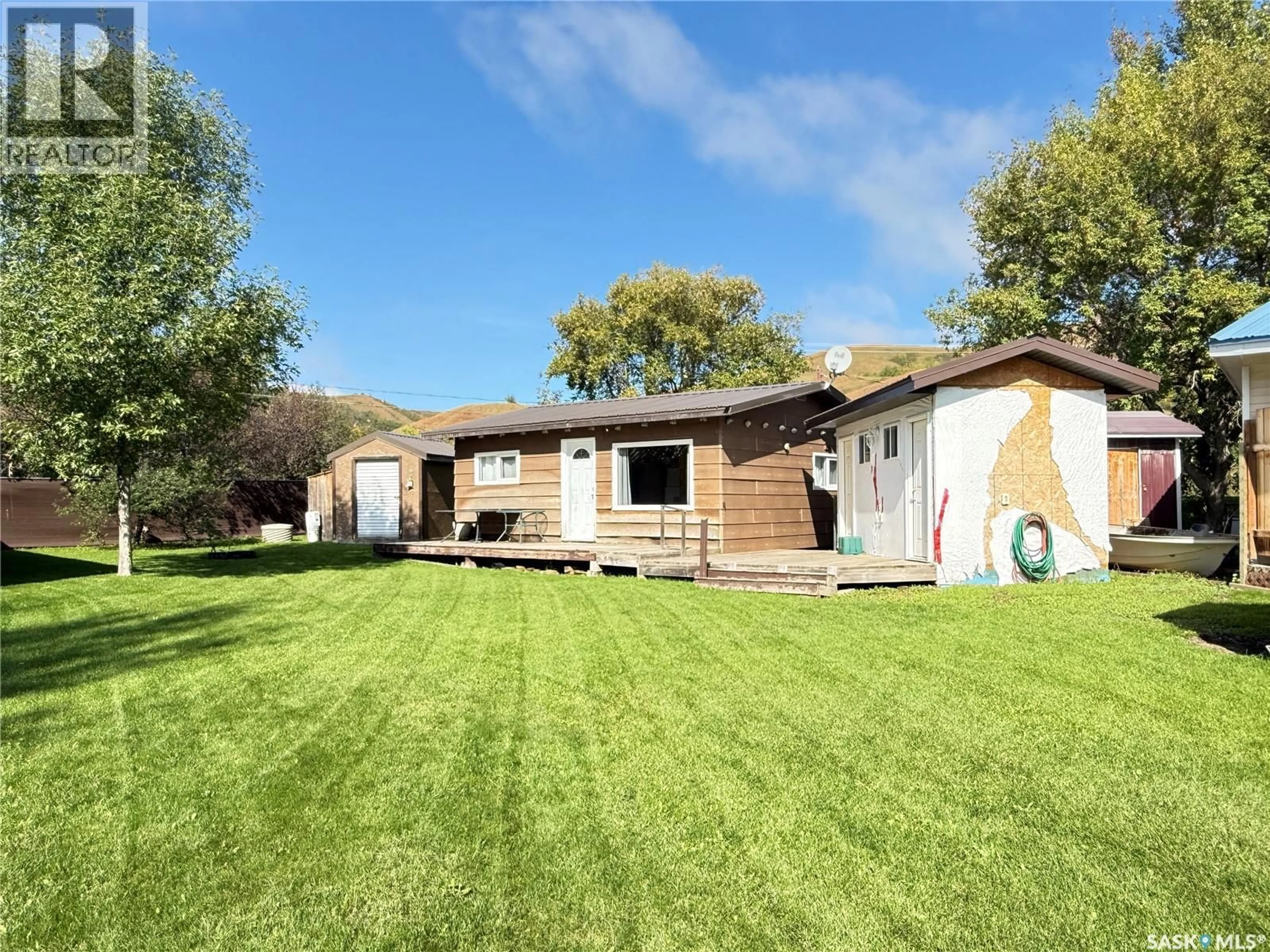 A pic from outside/outdoor area/front of a property/back of a property/a pic from drone, street for 13 GOTTINGER DRIVE, Melville Beach Saskatchewan S0A1X0
