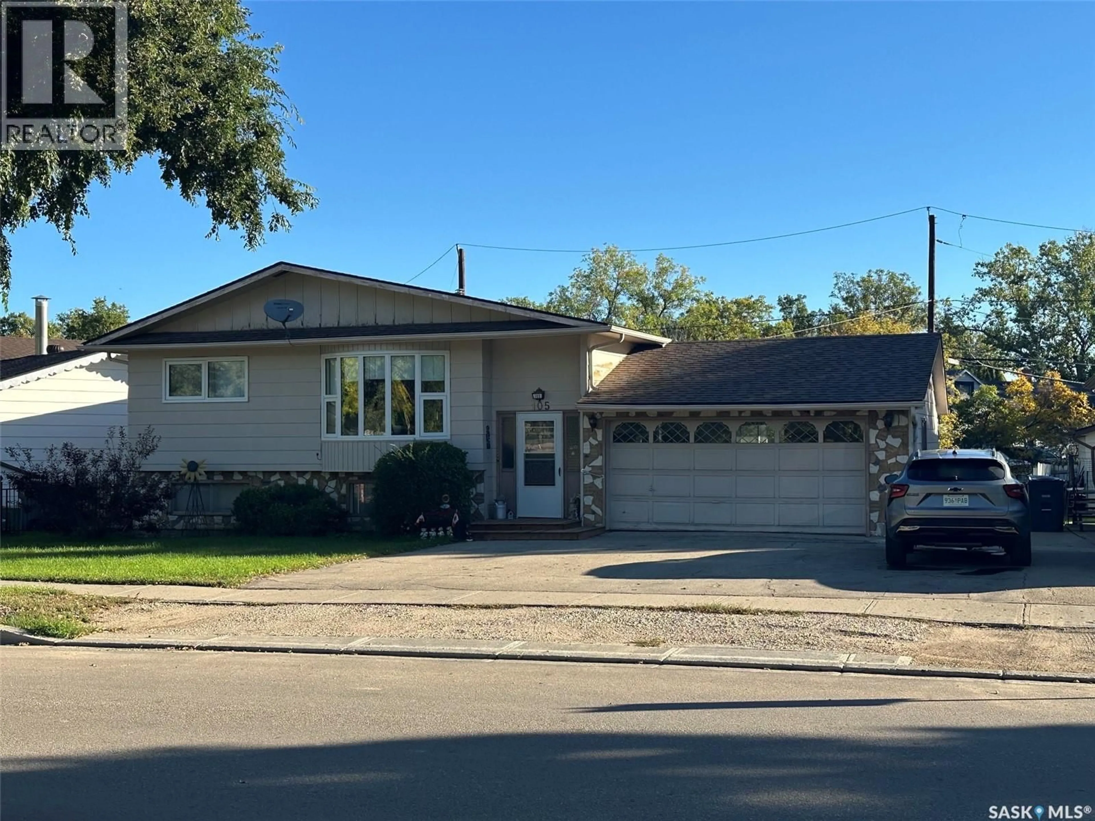Home with vinyl exterior material, street for 105 EMPIRE ROAD, Assiniboia Saskatchewan S0H0B0
