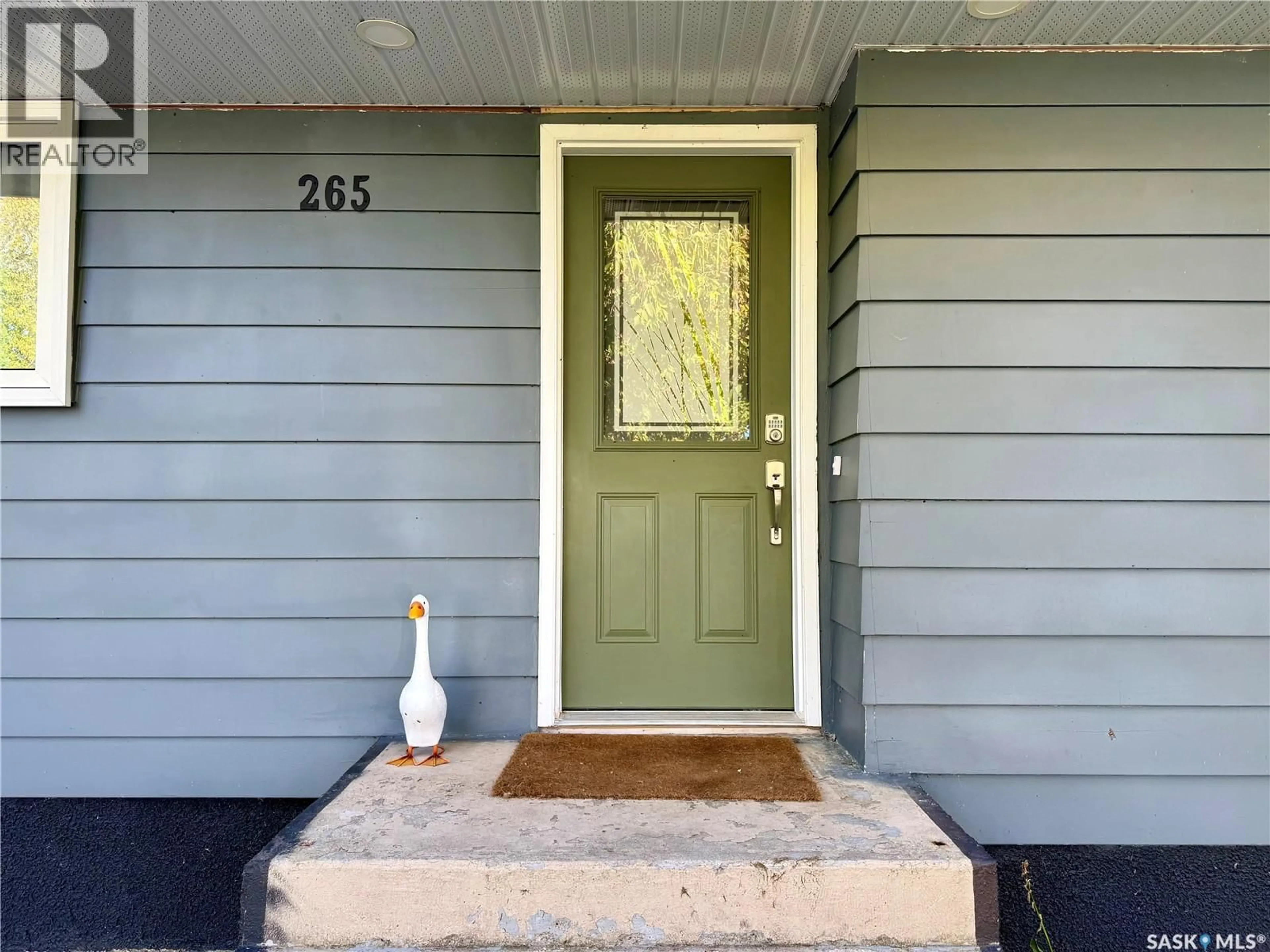 Home with vinyl exterior material, street for 265 5TH AVENUE, Melville Saskatchewan S0A2P0