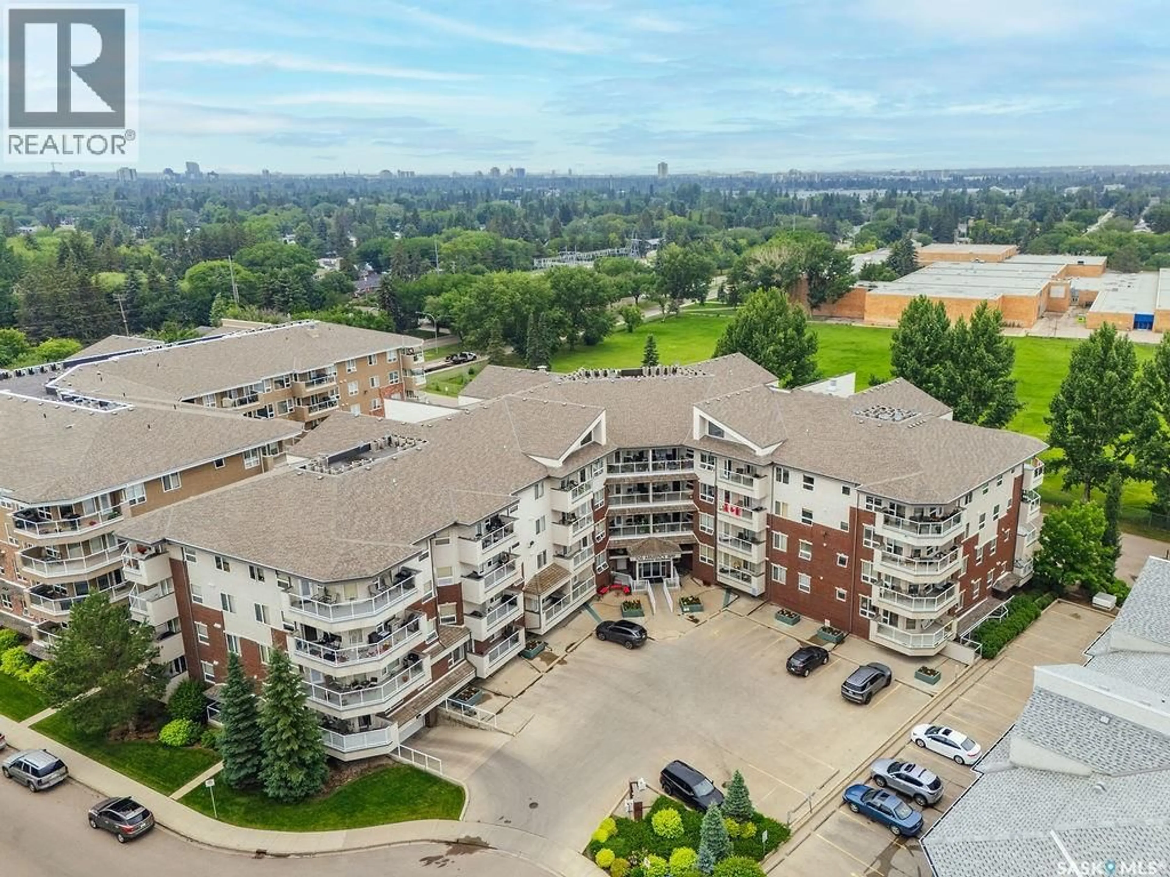 A pic from outside/outdoor area/front of a property/back of a property/a pic from drone, city buildings view from balcony for 106 - 113 ARMISTICE WAY, Saskatoon Saskatchewan S7J2H4