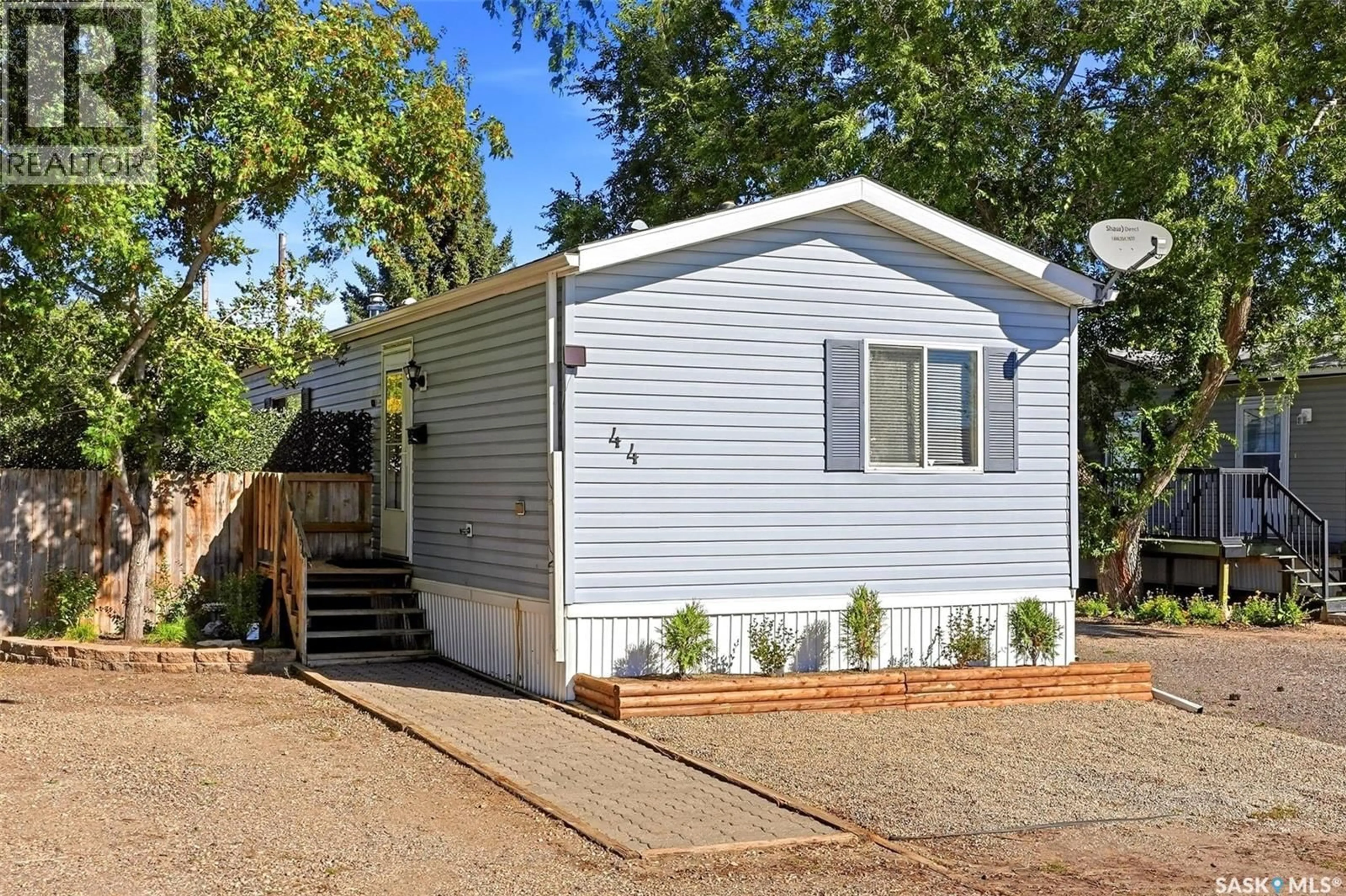Home with vinyl exterior material, street for 44 WALTERS COURT, Pilot Butte Saskatchewan S0G3Z0