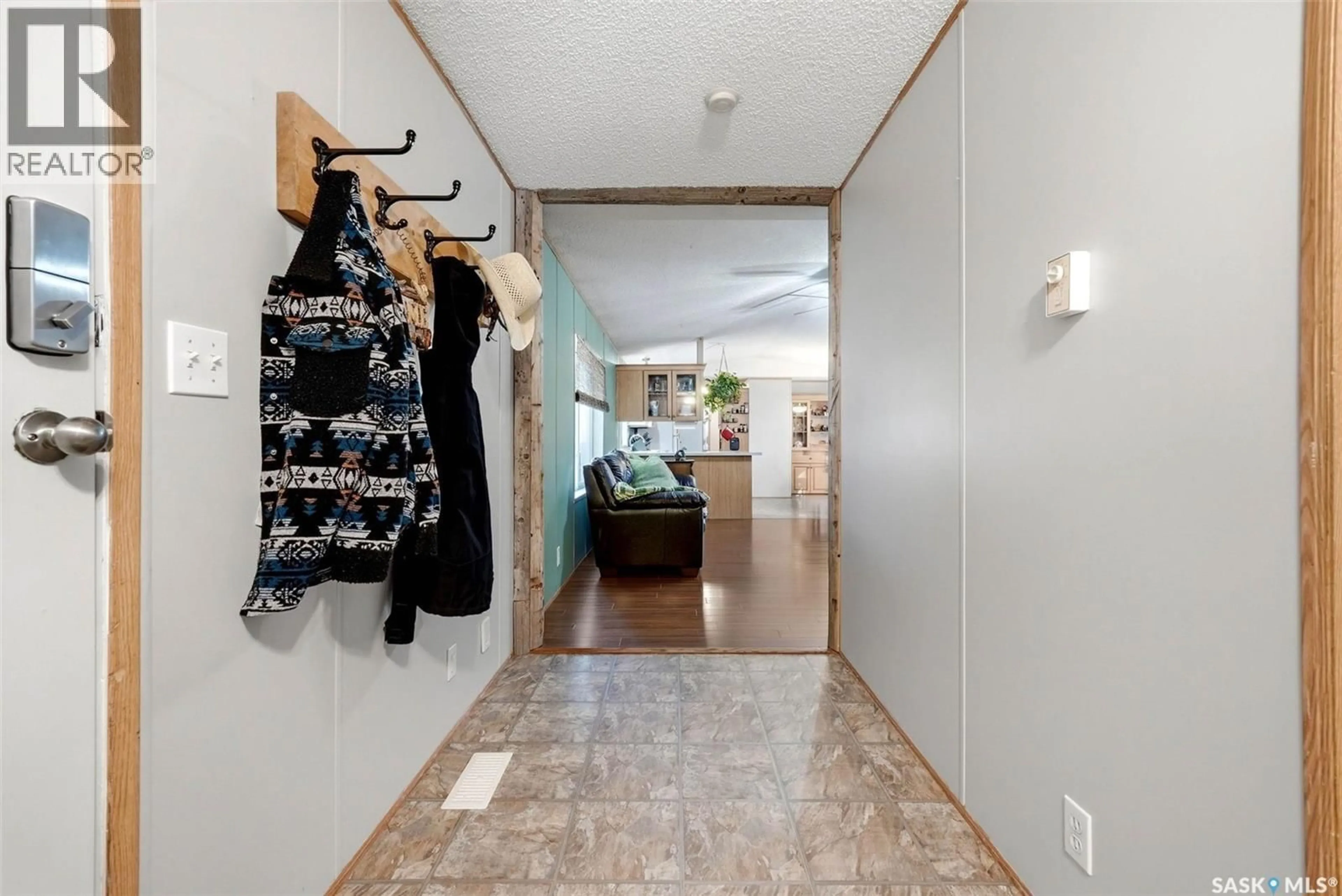 Indoor foyer for 44 WALTERS COURT, Pilot Butte Saskatchewan S0G3Z0
