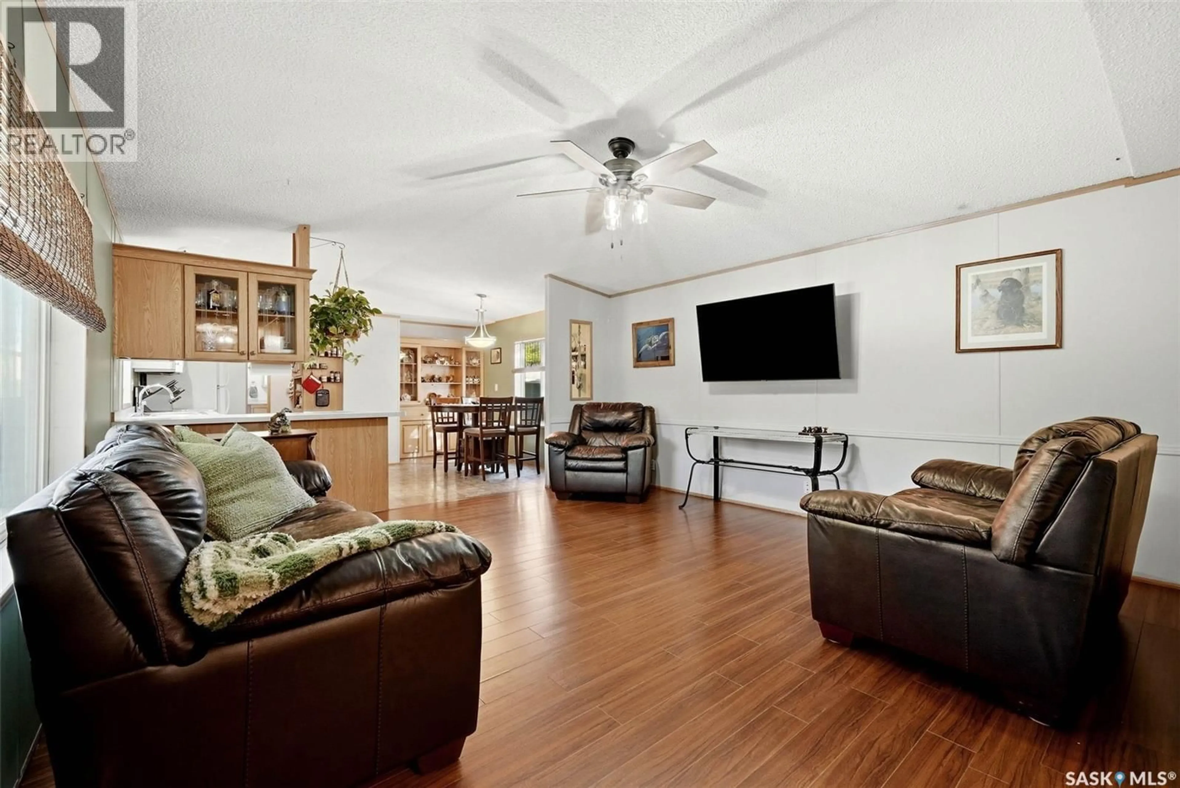 Living room with furniture, unknown for 44 WALTERS COURT, Pilot Butte Saskatchewan S0G3Z0