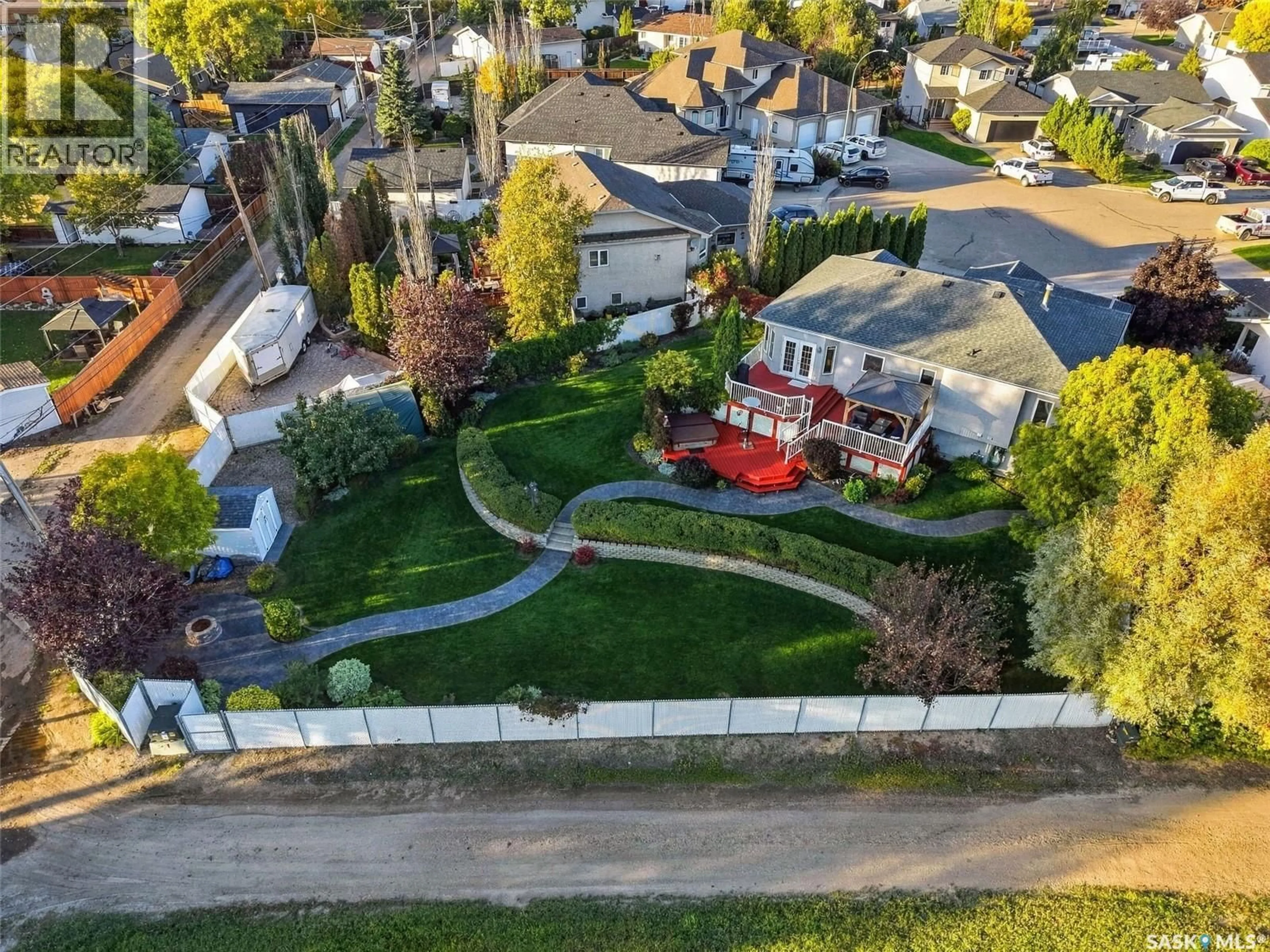 A pic from outside/outdoor area/front of a property/back of a property/a pic from drone, street for 726 PENNER PLACE, Martensville Saskatchewan S0K2T2