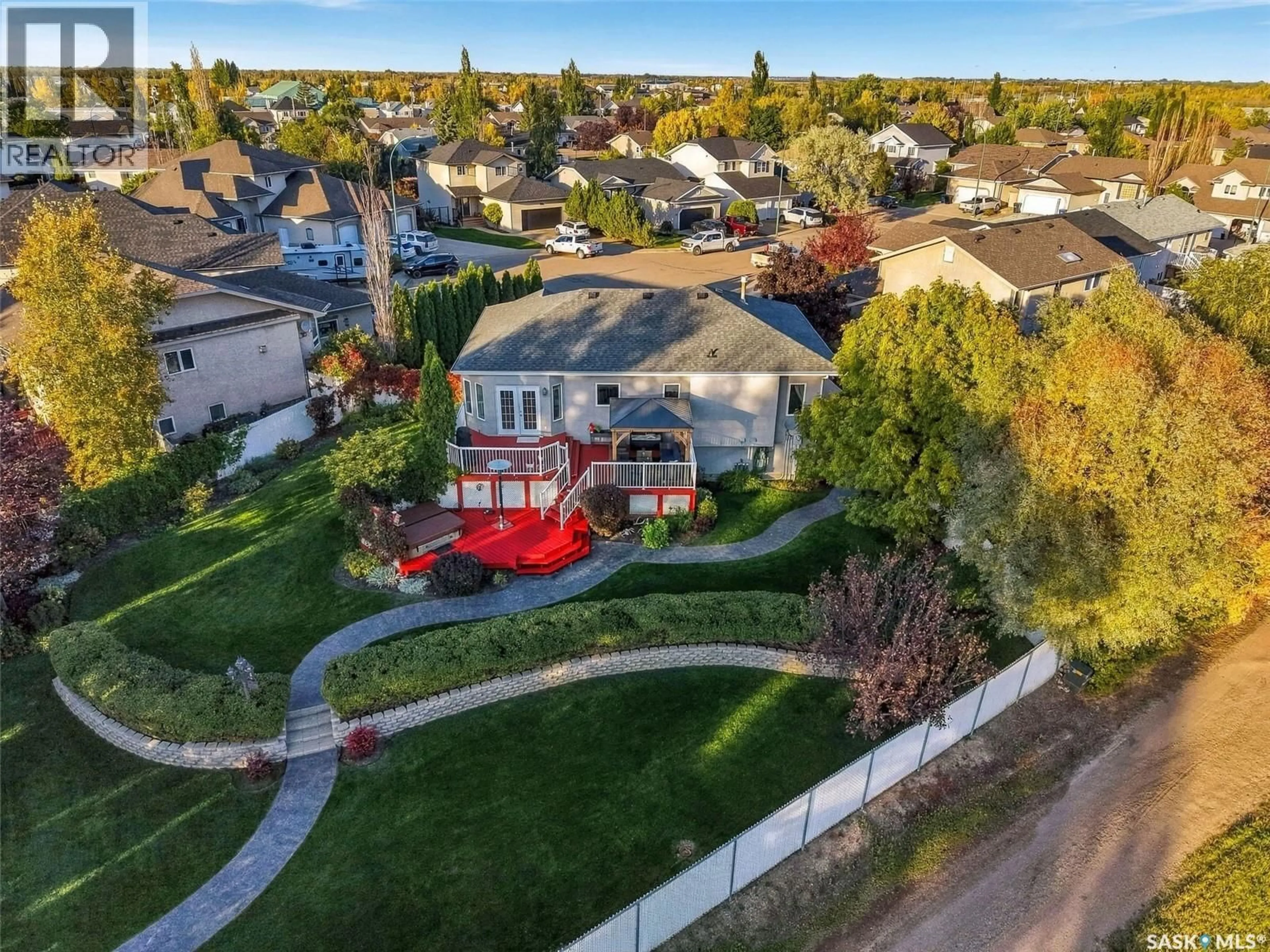 A pic from outside/outdoor area/front of a property/back of a property/a pic from drone, street for 726 PENNER PLACE, Martensville Saskatchewan S0K2T2