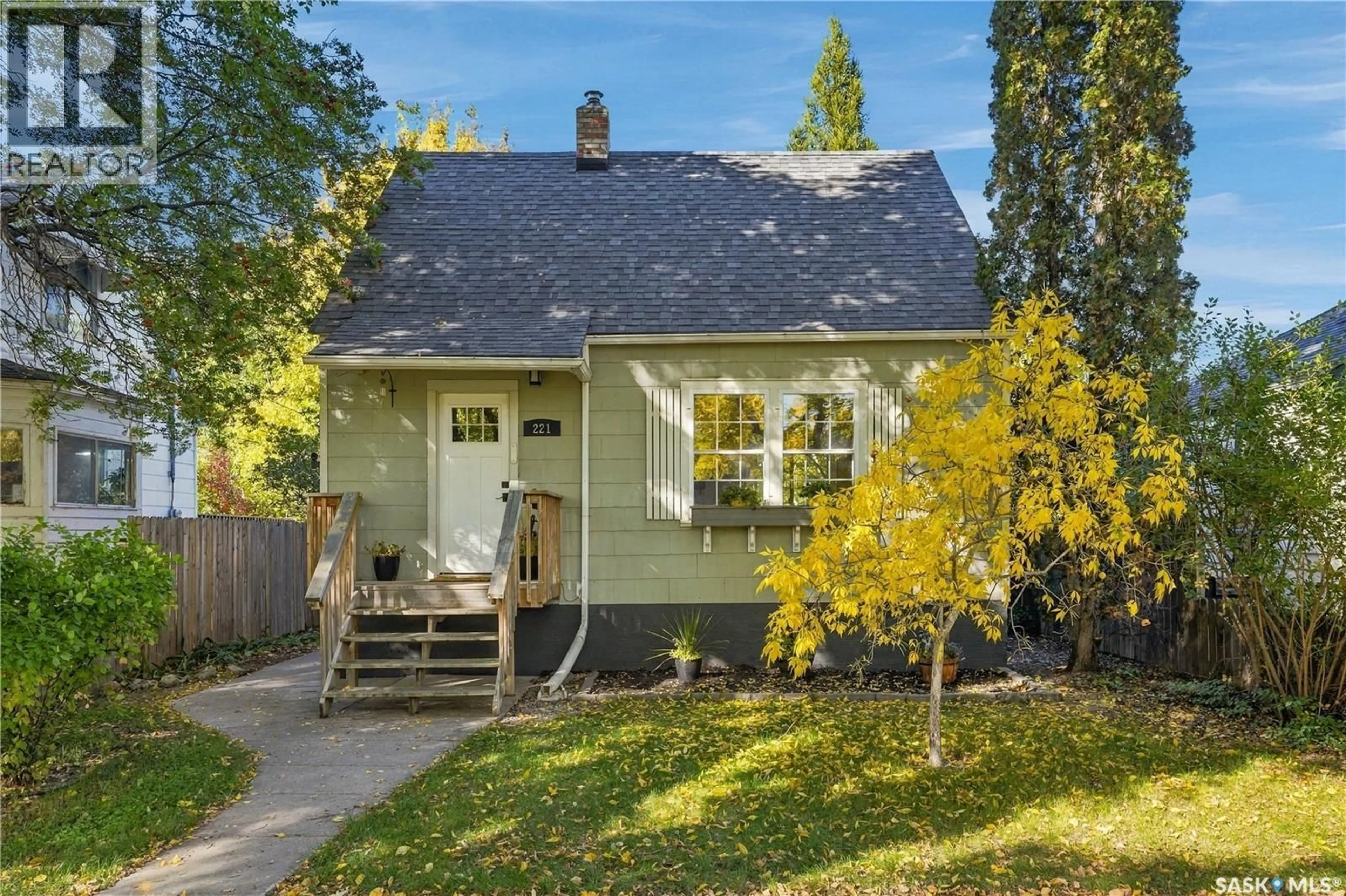 Home with vinyl exterior material, street for 221 ELM STREET, Saskatoon Saskatchewan S7J0G8