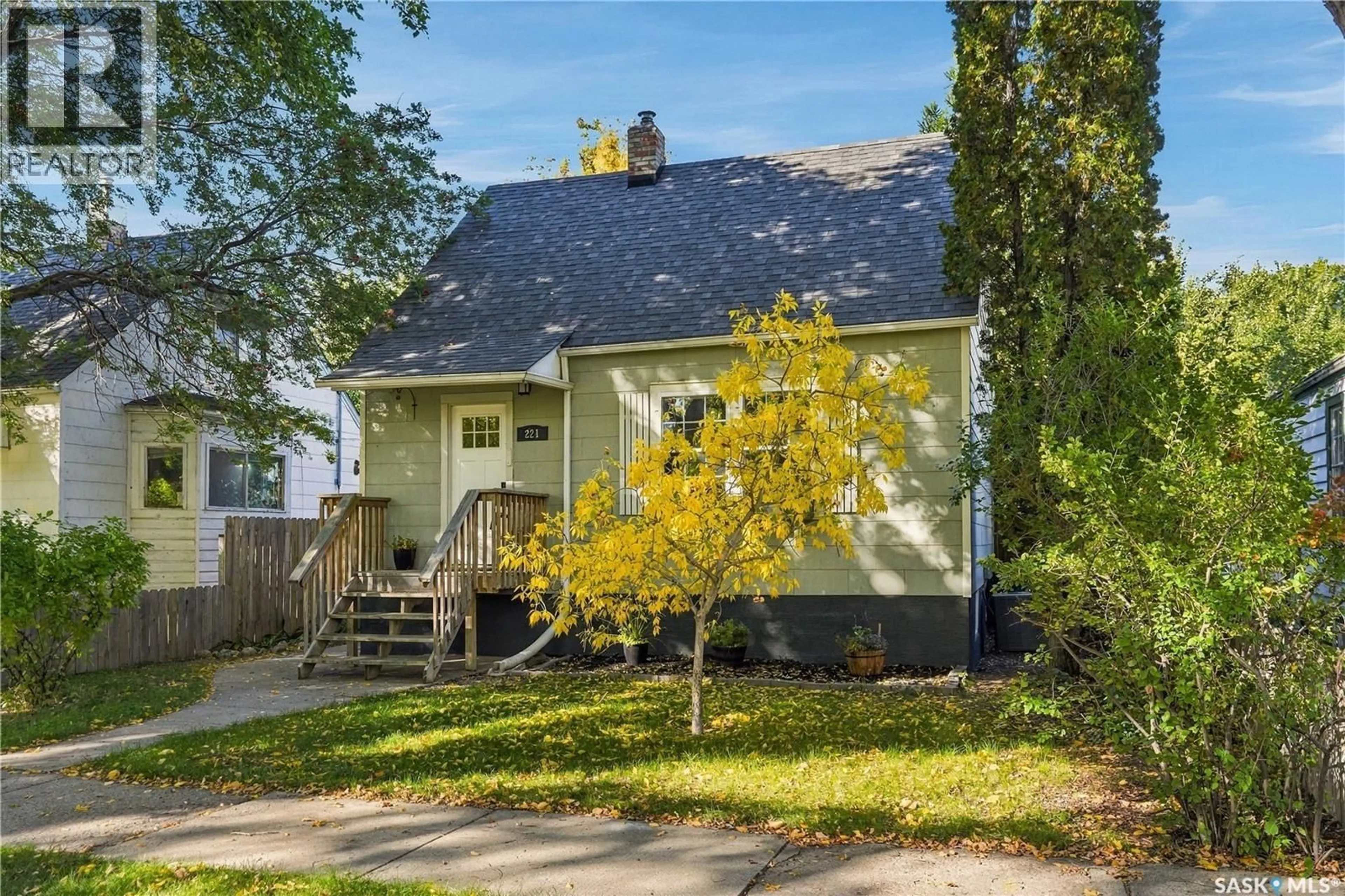 Home with vinyl exterior material, street for 221 ELM STREET, Saskatoon Saskatchewan S7J0G8