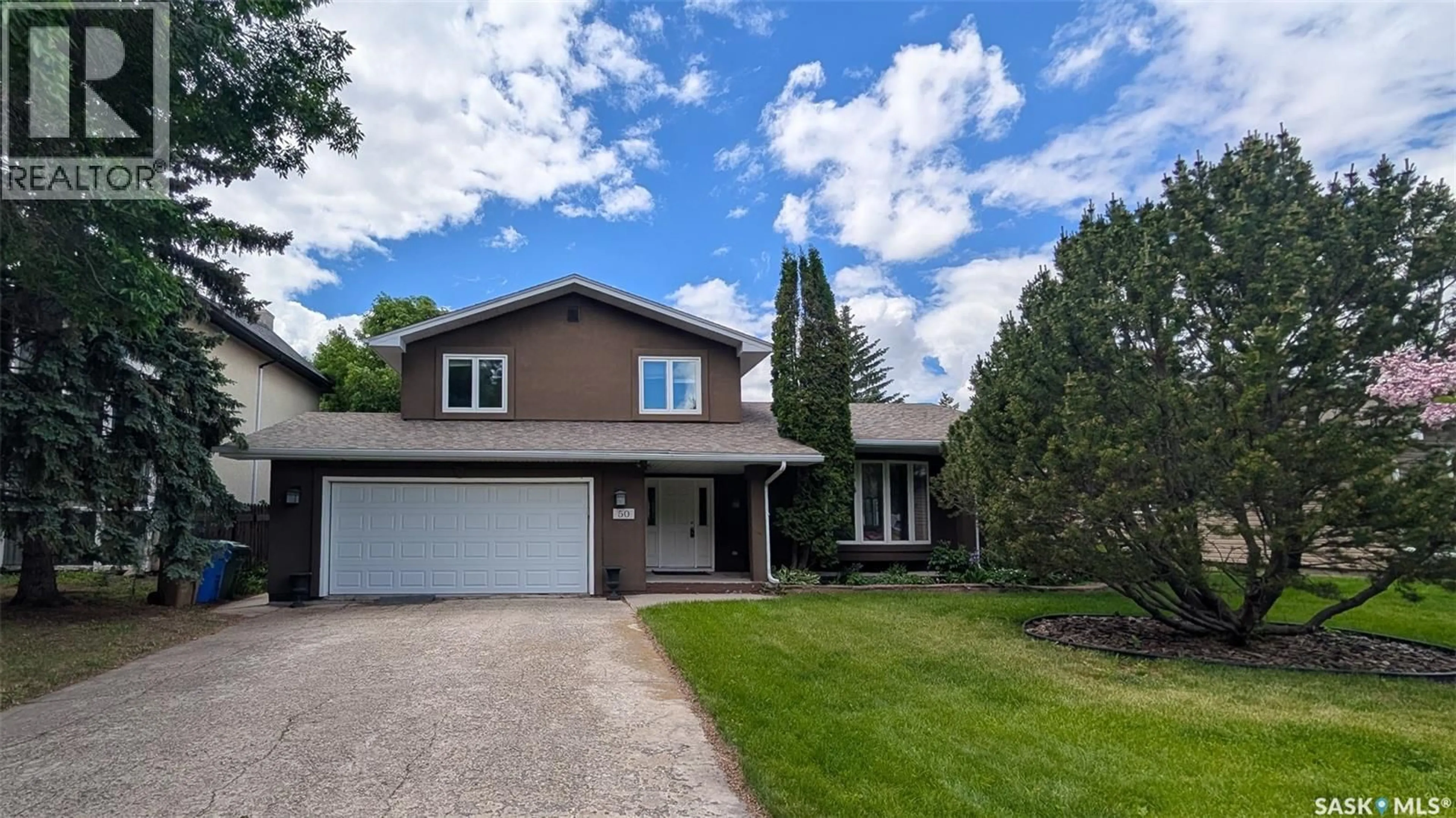 Home with vinyl exterior material, street for 50 LOWRY PLACE, Regina Saskatchewan S4S6C7