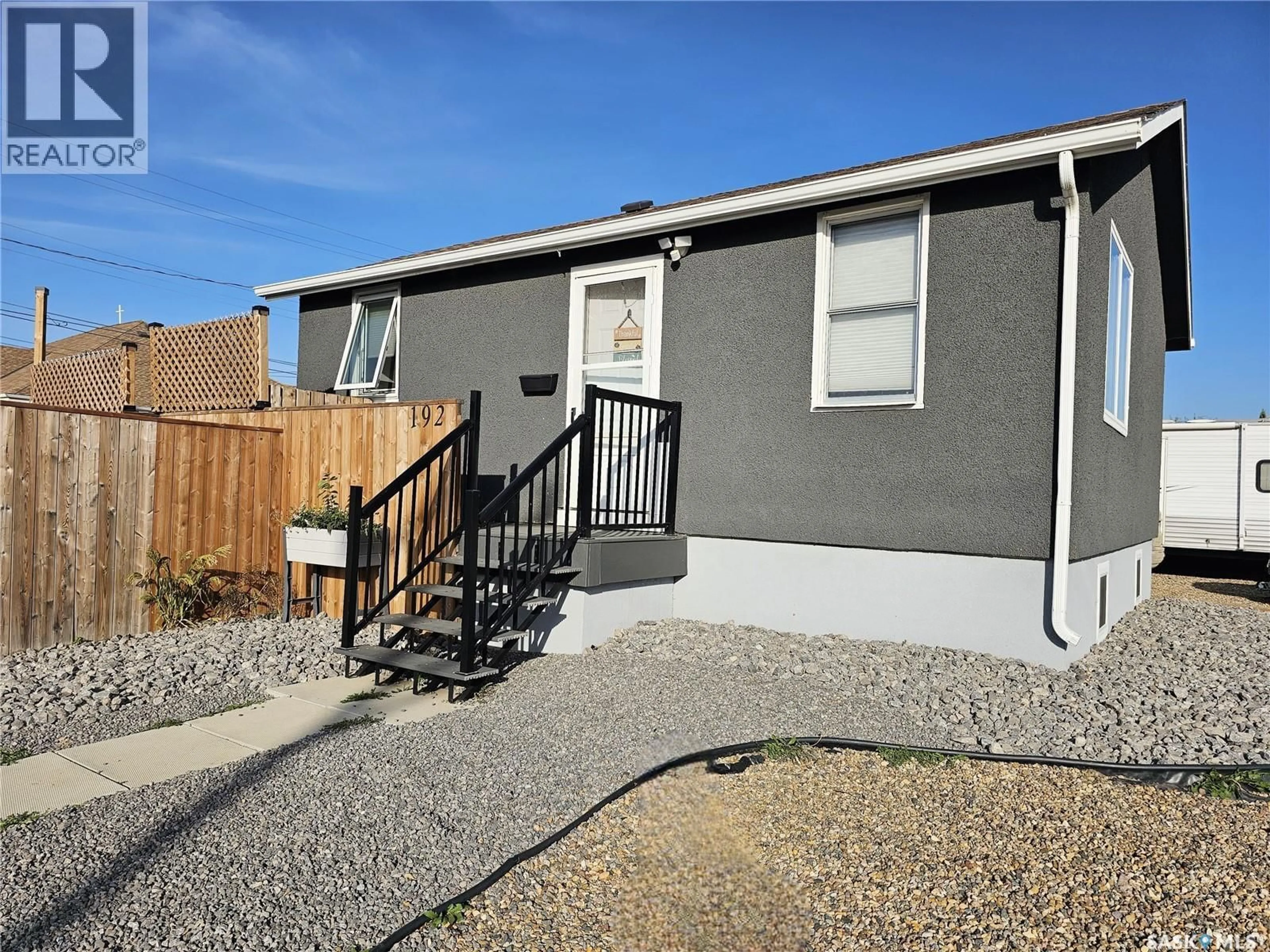 Home with vinyl exterior material, street for 192 23RD STREET, Battleford Saskatchewan S0M0E0