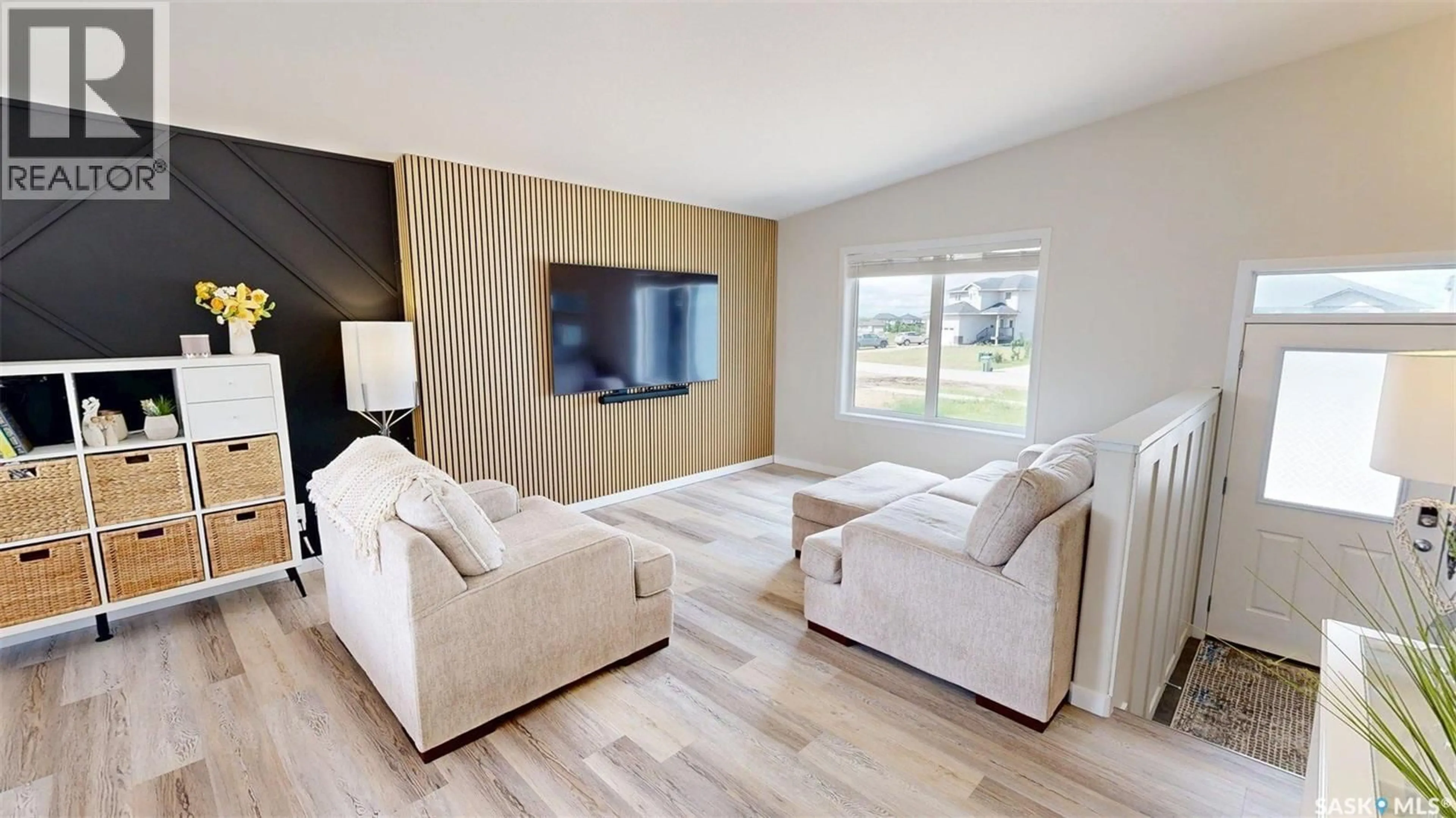 Living room with furniture, wood/laminate floor for 371 EMERALD PARK ROAD, Edenwold Rm No.158 Saskatchewan S4L0A7