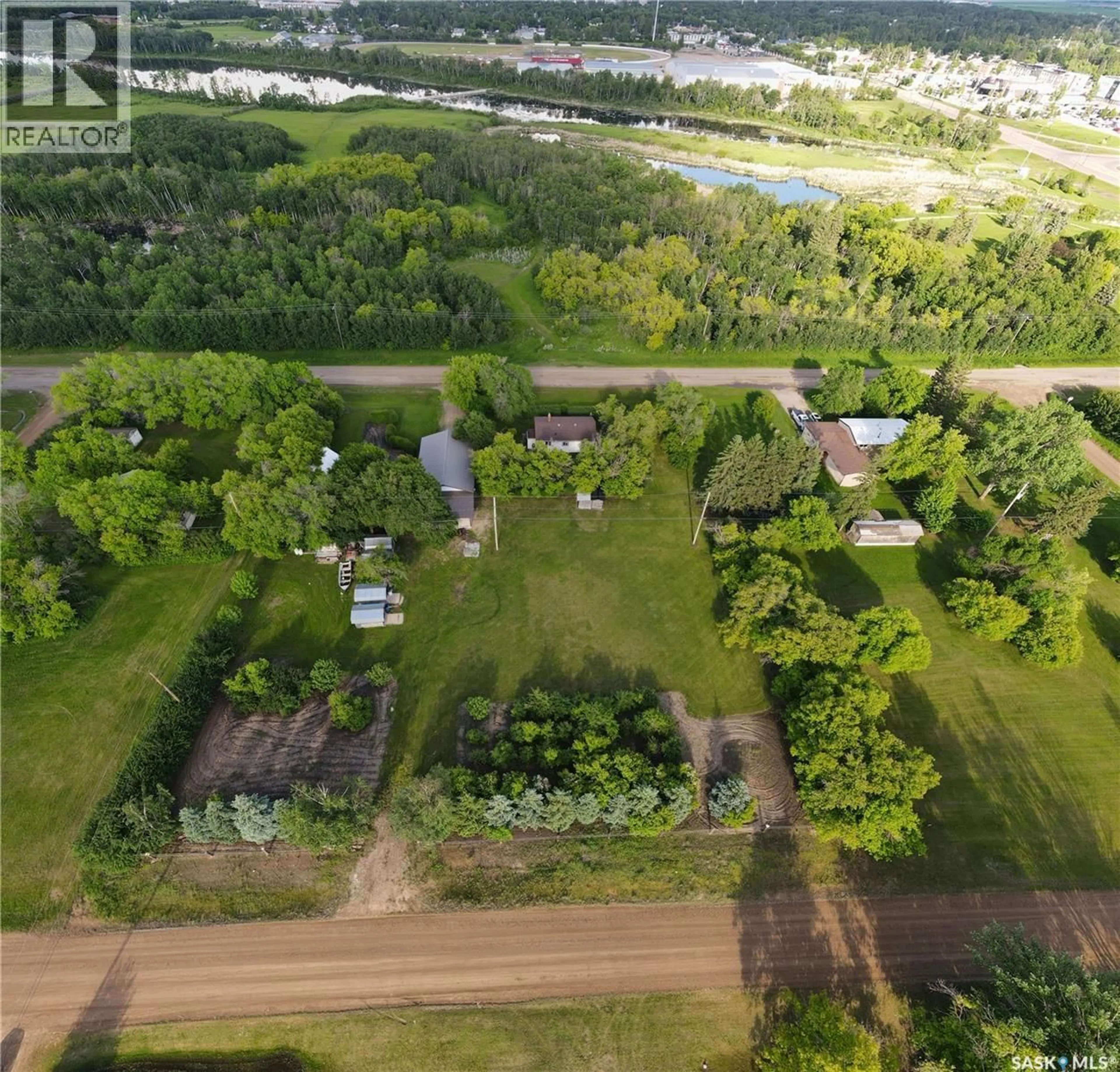 A pic from outside/outdoor area/front of a property/back of a property/a pic from drone, water/lake/river/ocean view for 212 SULLY AVENUE, Orkney Rm No. 244 Saskatchewan S3N4K1