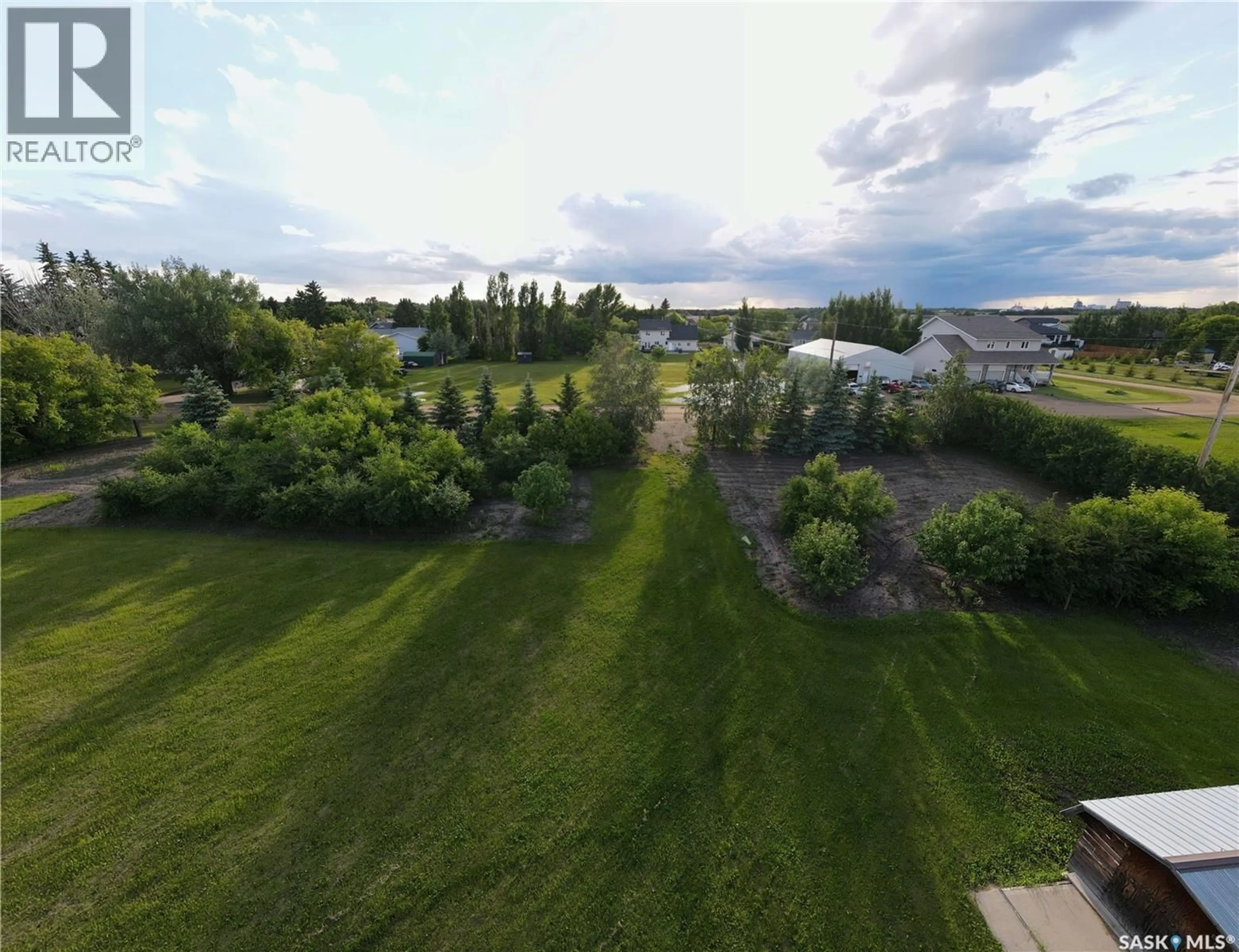 A pic from outside/outdoor area/front of a property/back of a property/a pic from drone, water/lake/river/ocean view for 212 SULLY AVENUE, Orkney Rm No. 244 Saskatchewan S3N4K1