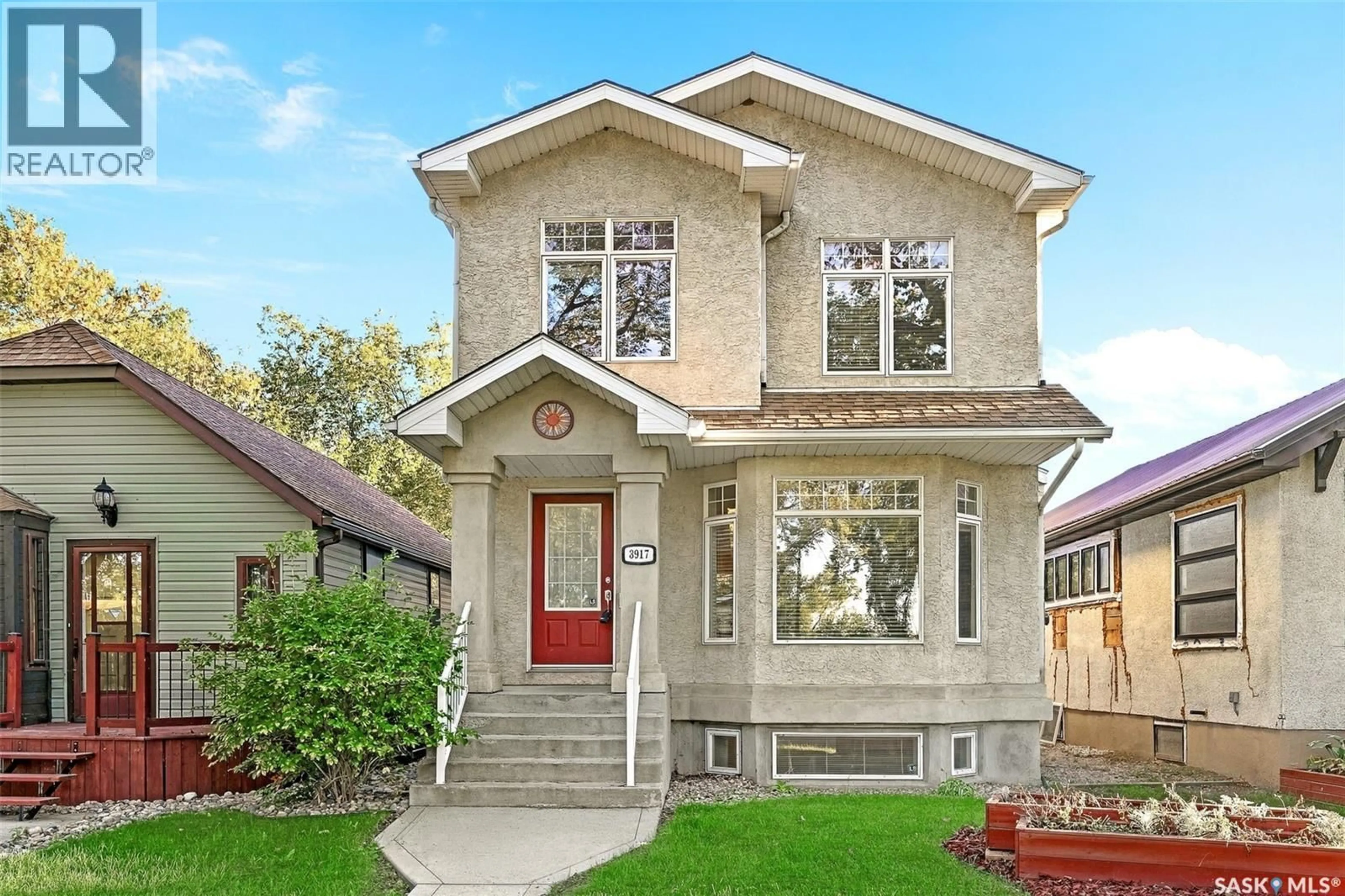 Home with brick exterior material, street for 3917 VICTORIA AVENUE, Regina Saskatchewan S4T1M7