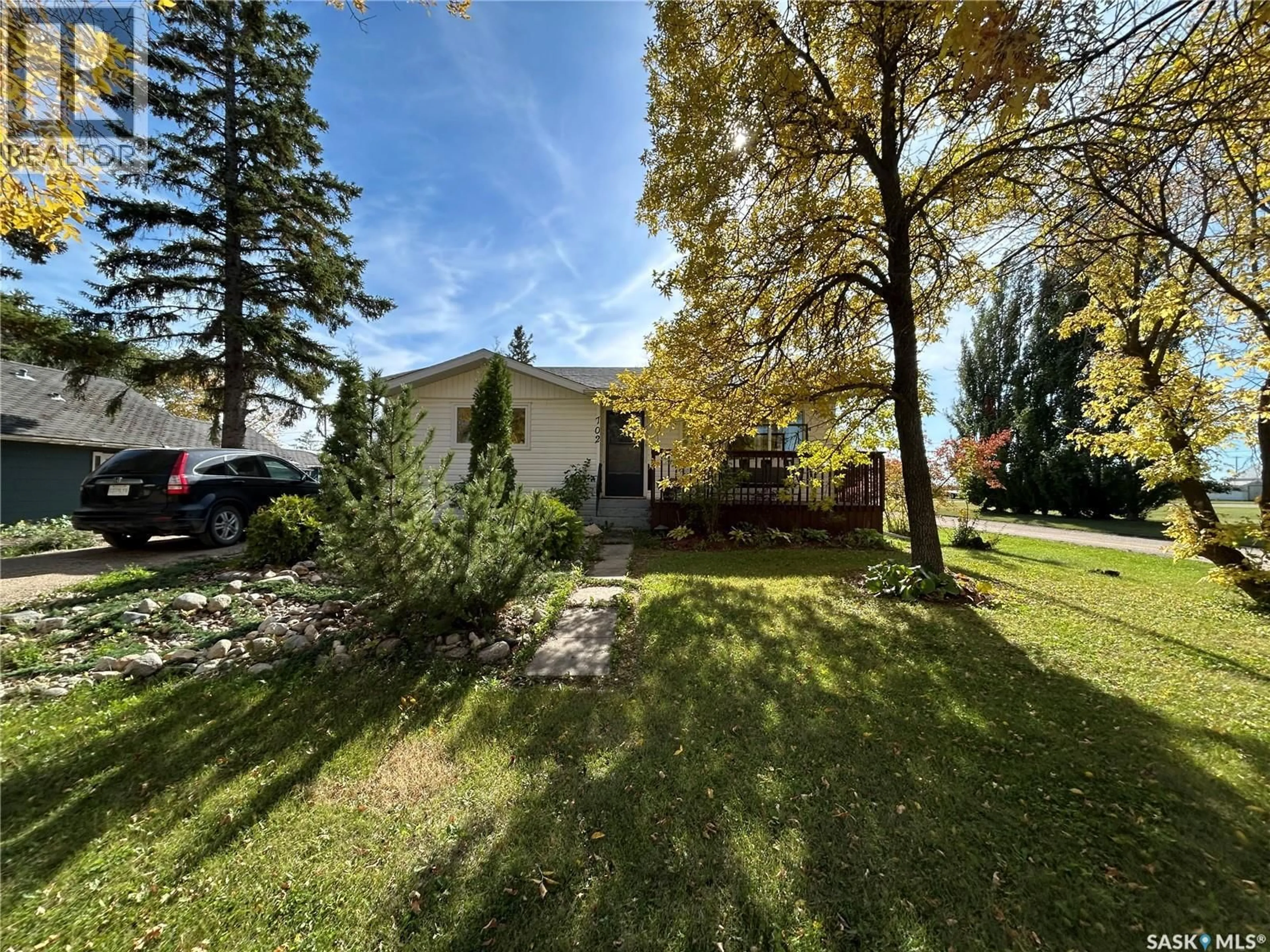 A pic from outside/outdoor area/front of a property/back of a property/a pic from drone, street for 702 101ST AVENUE, Tisdale Saskatchewan S0E1T0