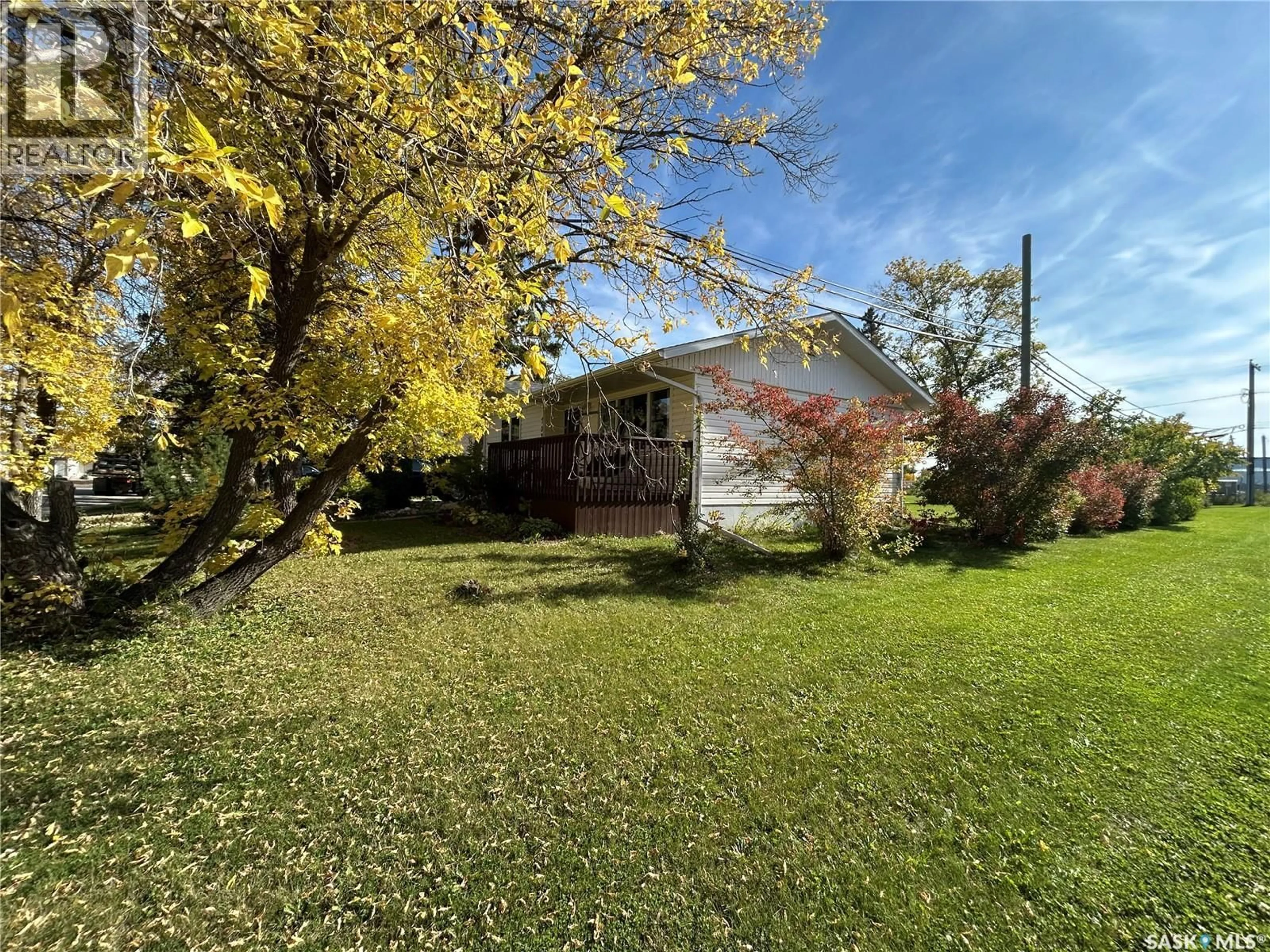 A pic from outside/outdoor area/front of a property/back of a property/a pic from drone, street for 702 101ST AVENUE, Tisdale Saskatchewan S0E1T0