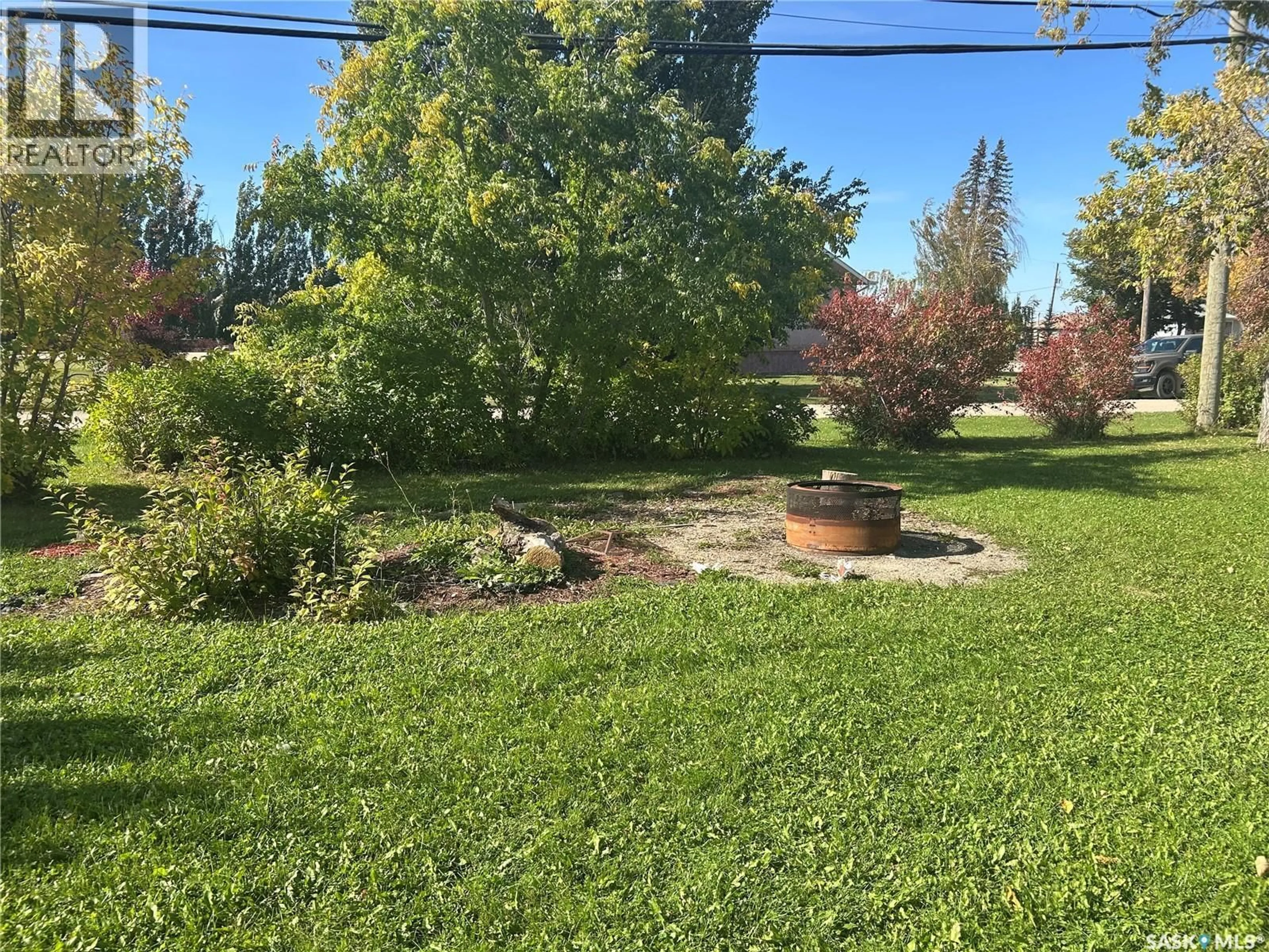 A pic from outside/outdoor area/front of a property/back of a property/a pic from drone, unknown for 702 101ST AVENUE, Tisdale Saskatchewan S0E1T0