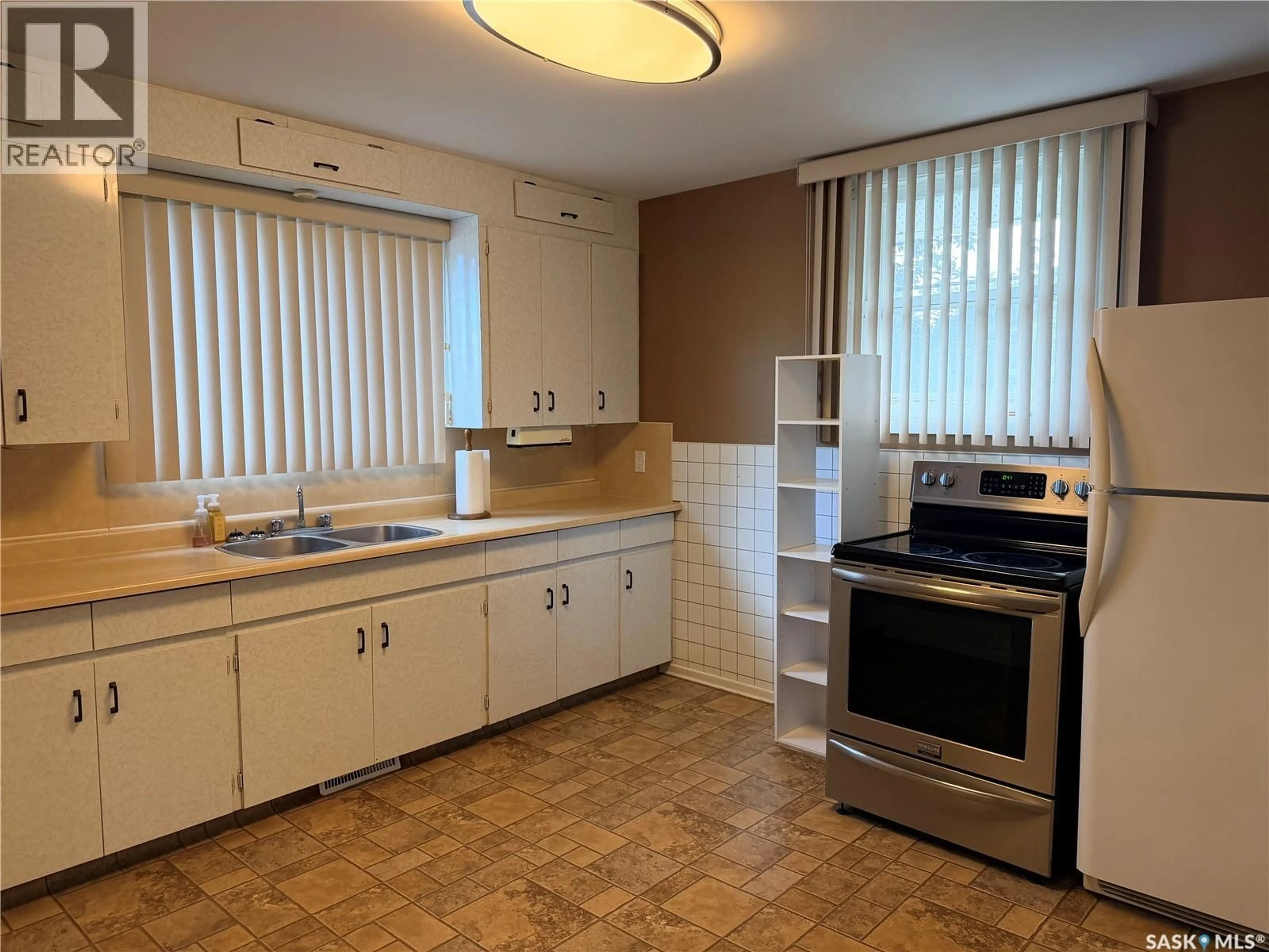 Standard kitchen, ceramic/tile floor for 203 4TH AVENUE, Assiniboia Saskatchewan S0H0B0