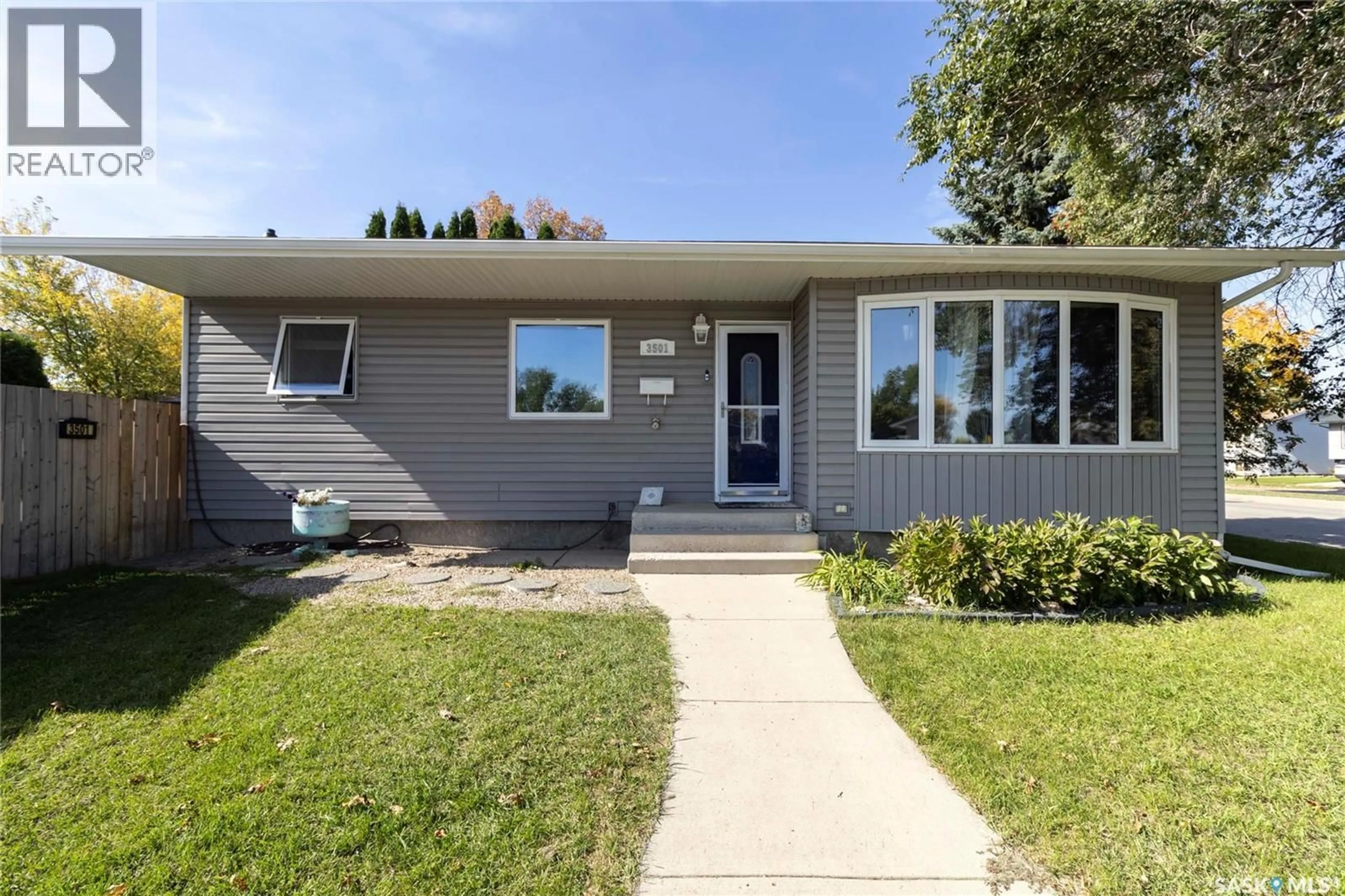 Home with vinyl exterior material, street for 3501 33RD STREET, Saskatoon Saskatchewan S7L4P6