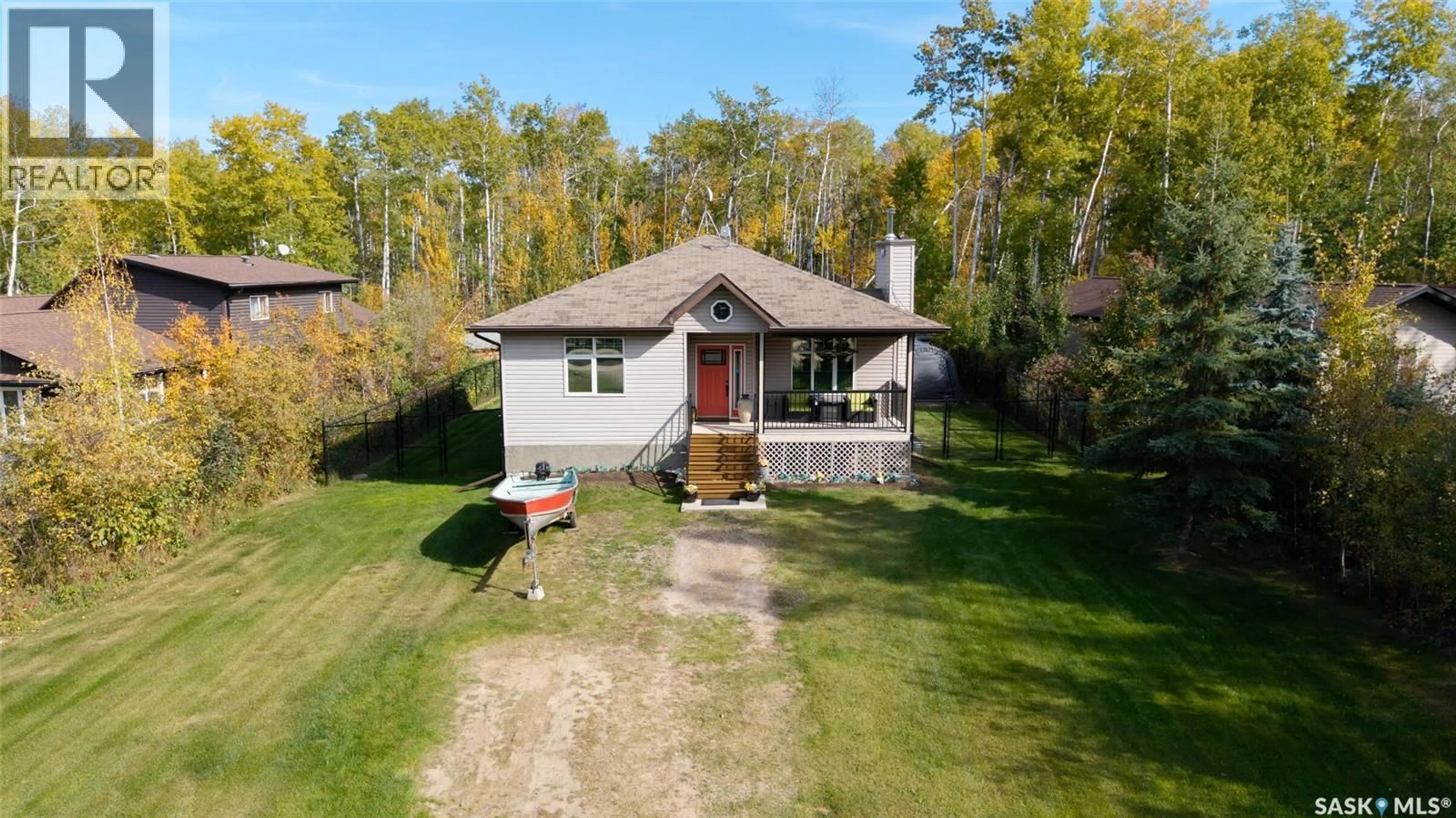 A pic from outside/outdoor area/front of a property/back of a property/a pic from drone, unknown for 303B LAC DES ILES ROAD, Lac des Îles Saskatchewan S0M1A0