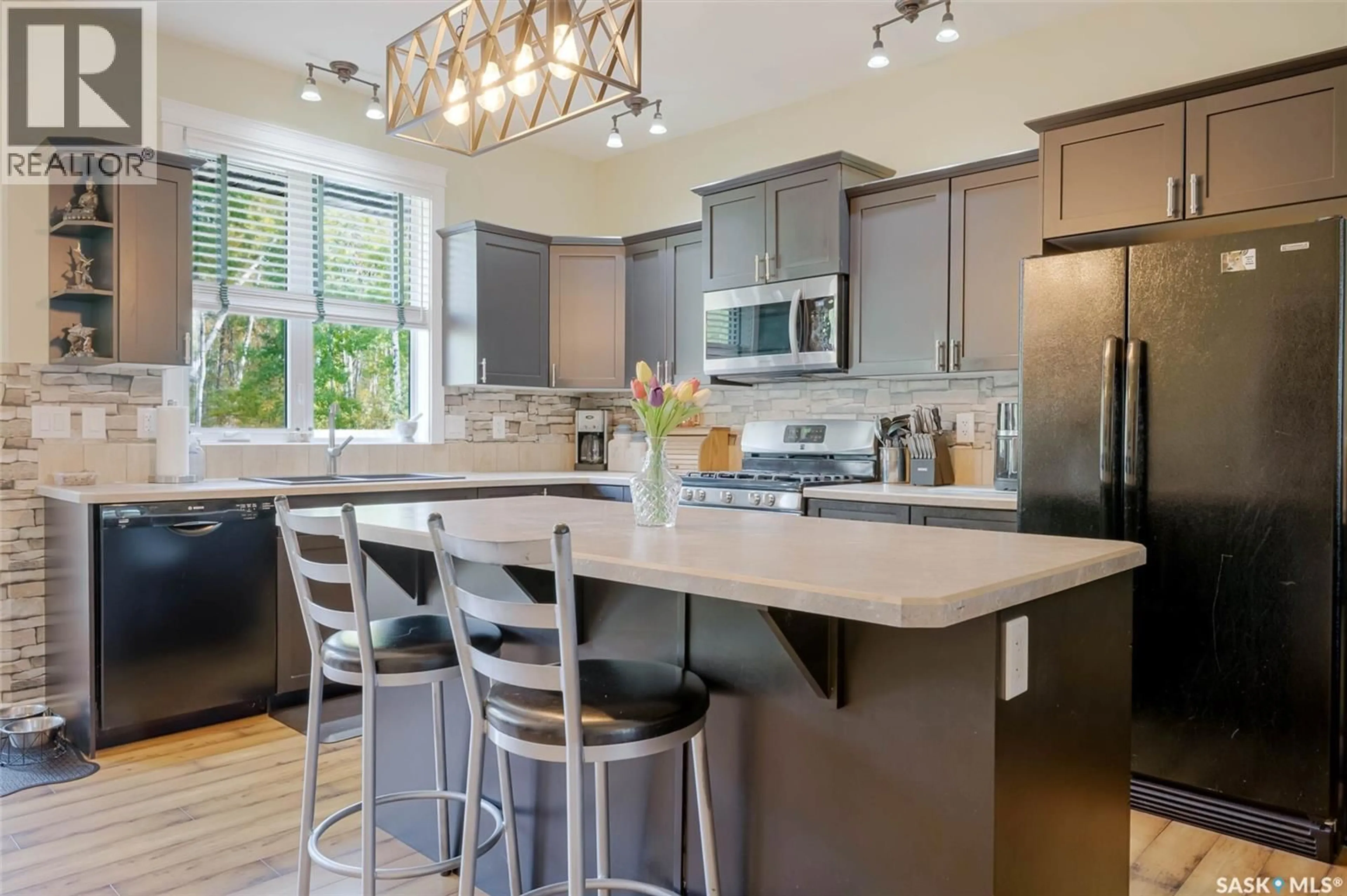 Open concept kitchen, unknown for 303B LAC DES ILES ROAD, Lac des Îles Saskatchewan S0M1A0