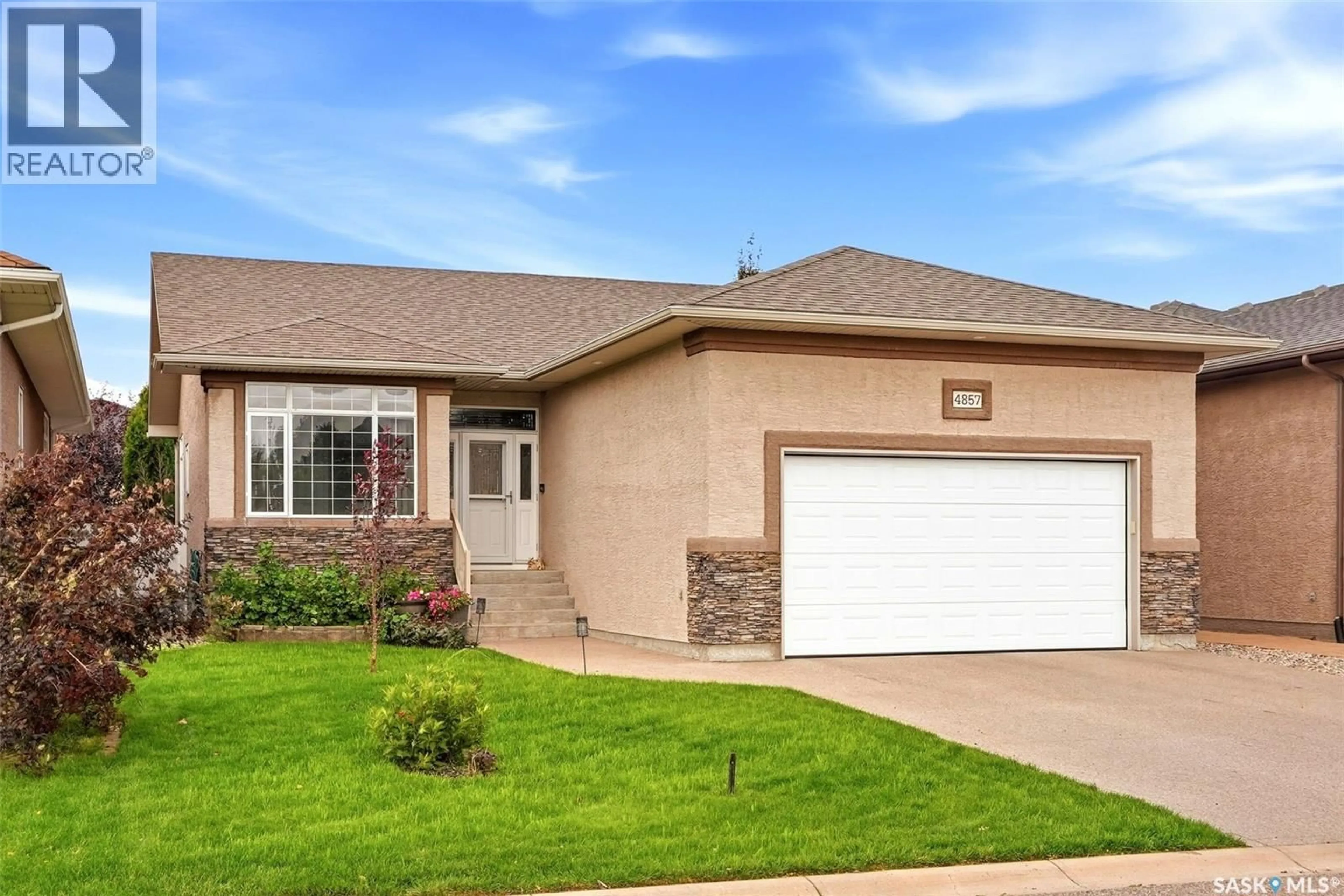 Home with brick exterior material, street for 4857 MCCOMBIE CRESCENT, Regina Saskatchewan S4W0B2