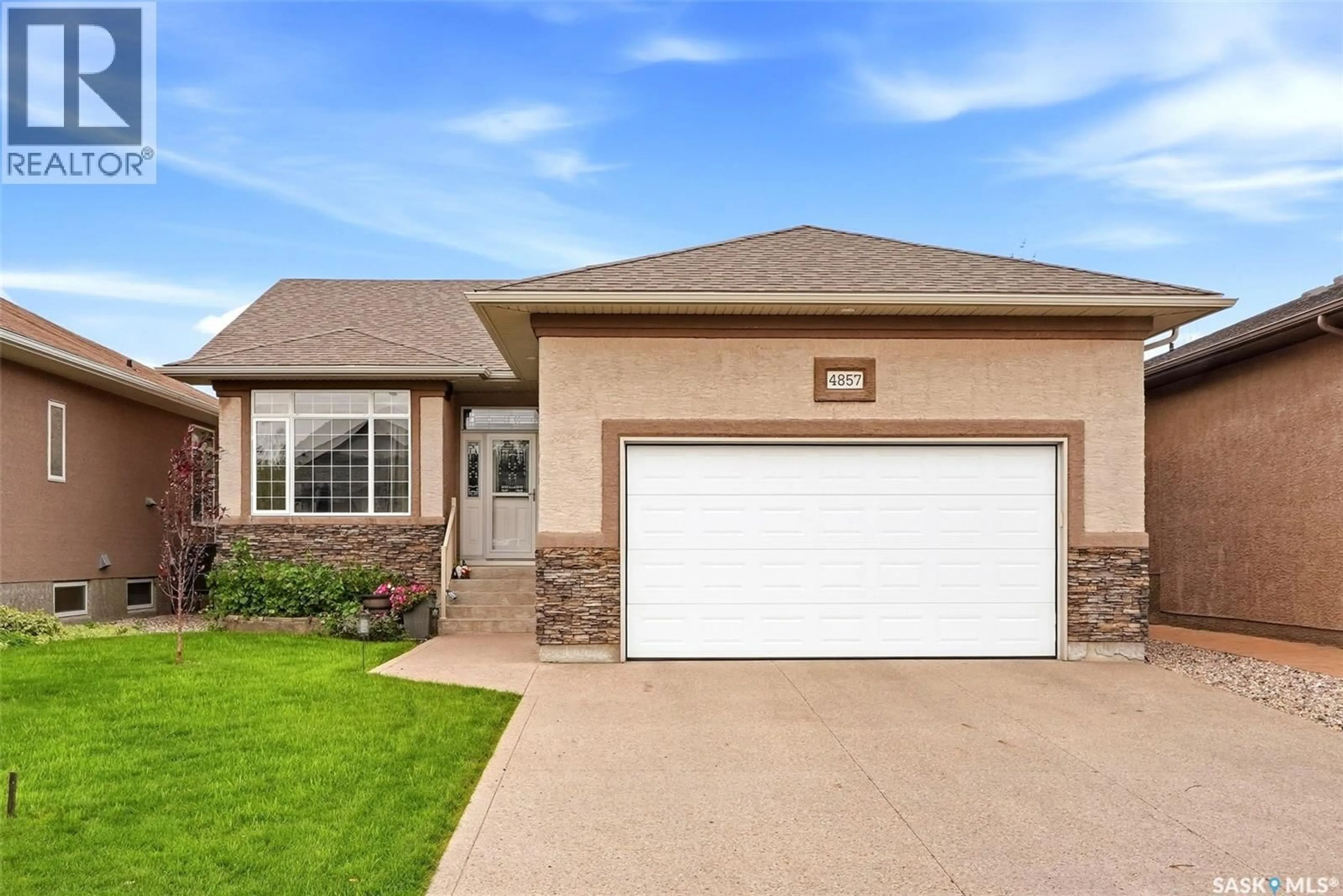 Home with brick exterior material, street for 4857 MCCOMBIE CRESCENT, Regina Saskatchewan S4W0B2