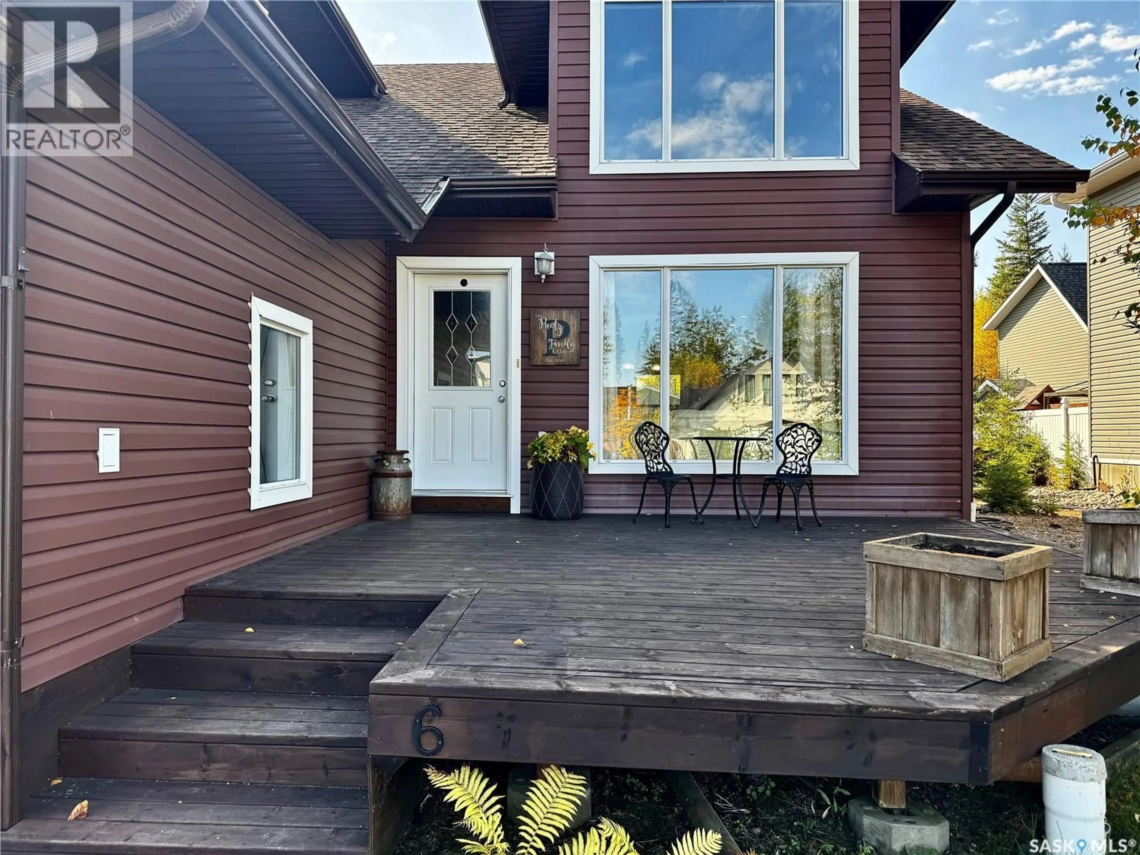 Home with vinyl exterior material, street for 6 ISLANDER DRIVE, Candle Lake Saskatchewan S0J3E0