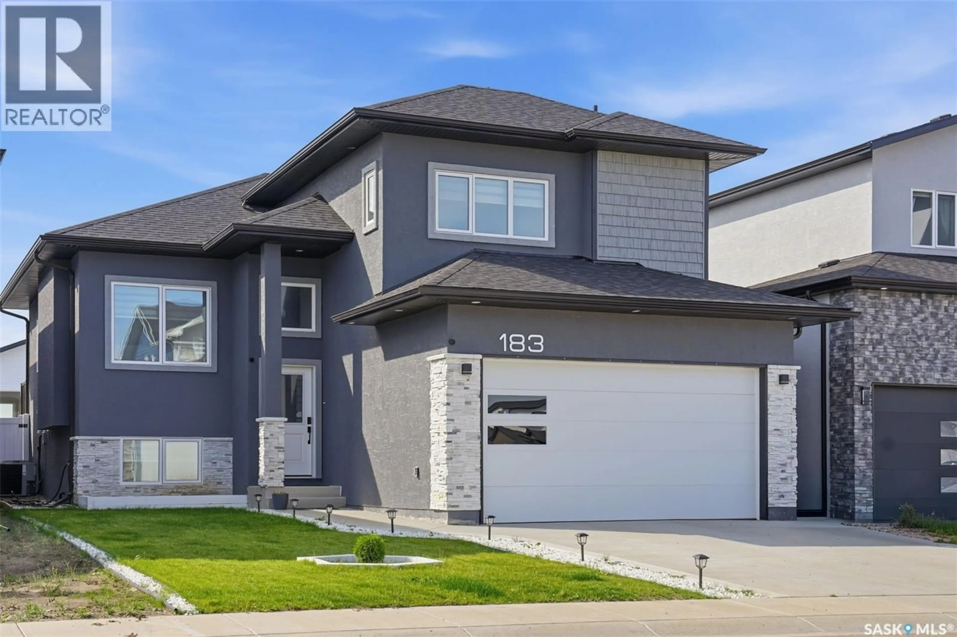 Home with vinyl exterior material, street for 183 MAZUREK CRESCENT, Saskatoon Saskatchewan S7V1S2