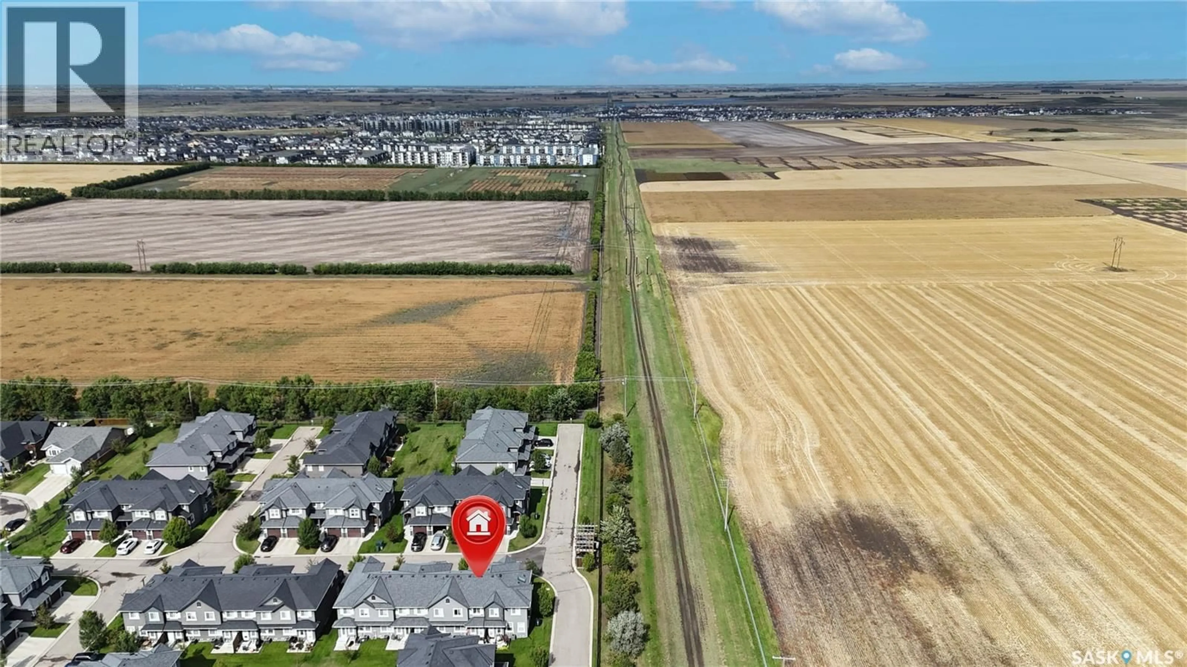 A pic from outside/outdoor area/front of a property/back of a property/a pic from drone, street for 416 - 1303 PATON CRESCENT, Saskatoon Saskatchewan S7W0P7