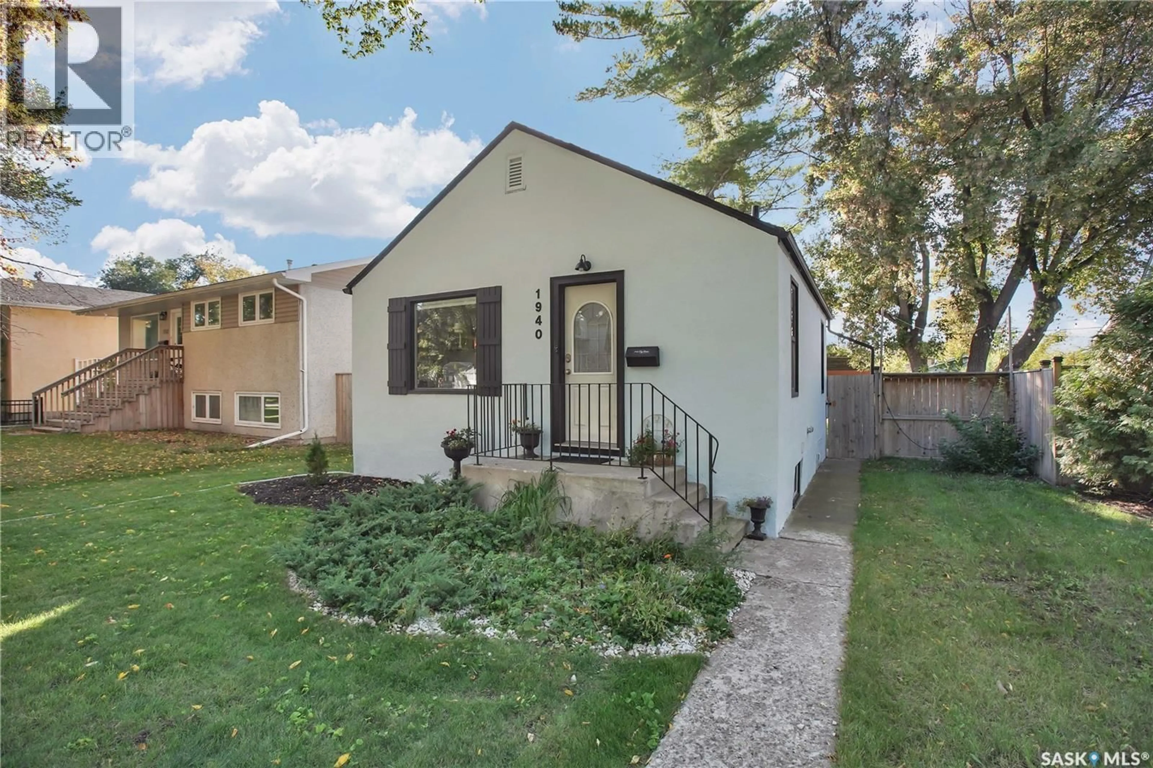 Home with vinyl exterior material, street for 1940 COY AVENUE, Saskatoon Saskatchewan S7M0J1