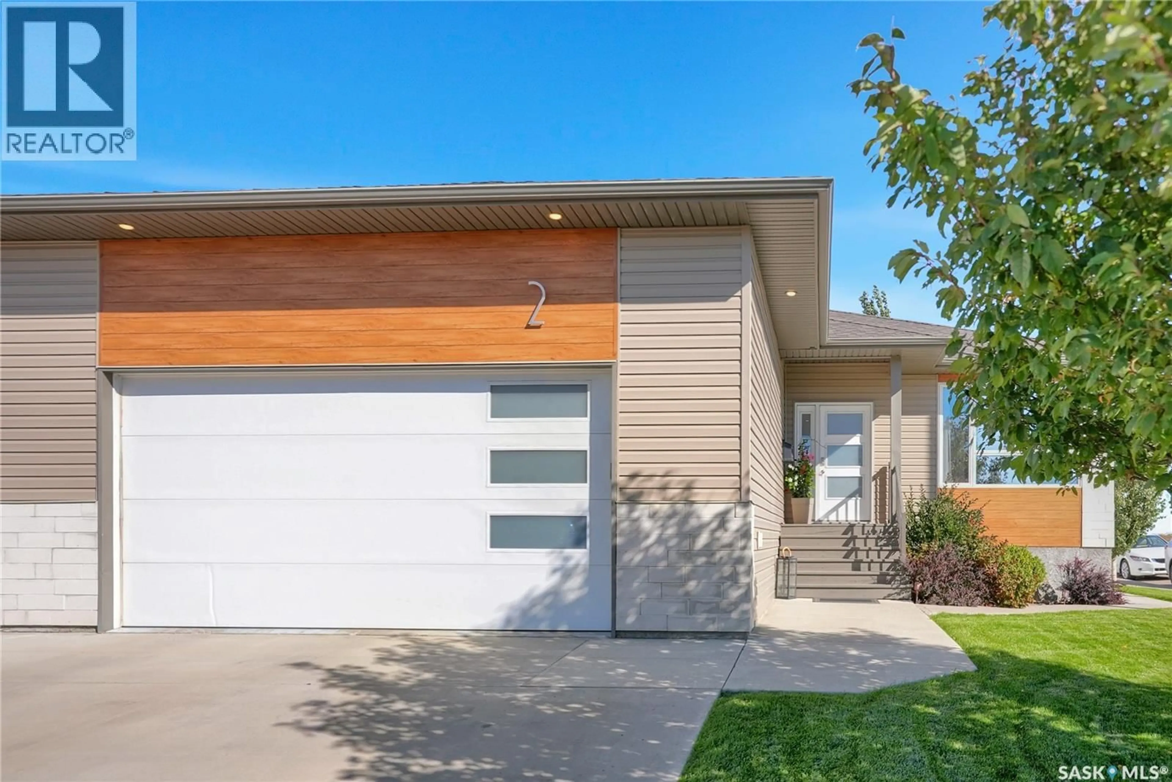 Home with vinyl exterior material, street for 2 BRODA TERRACE, Moose Jaw Saskatchewan S6J0E1