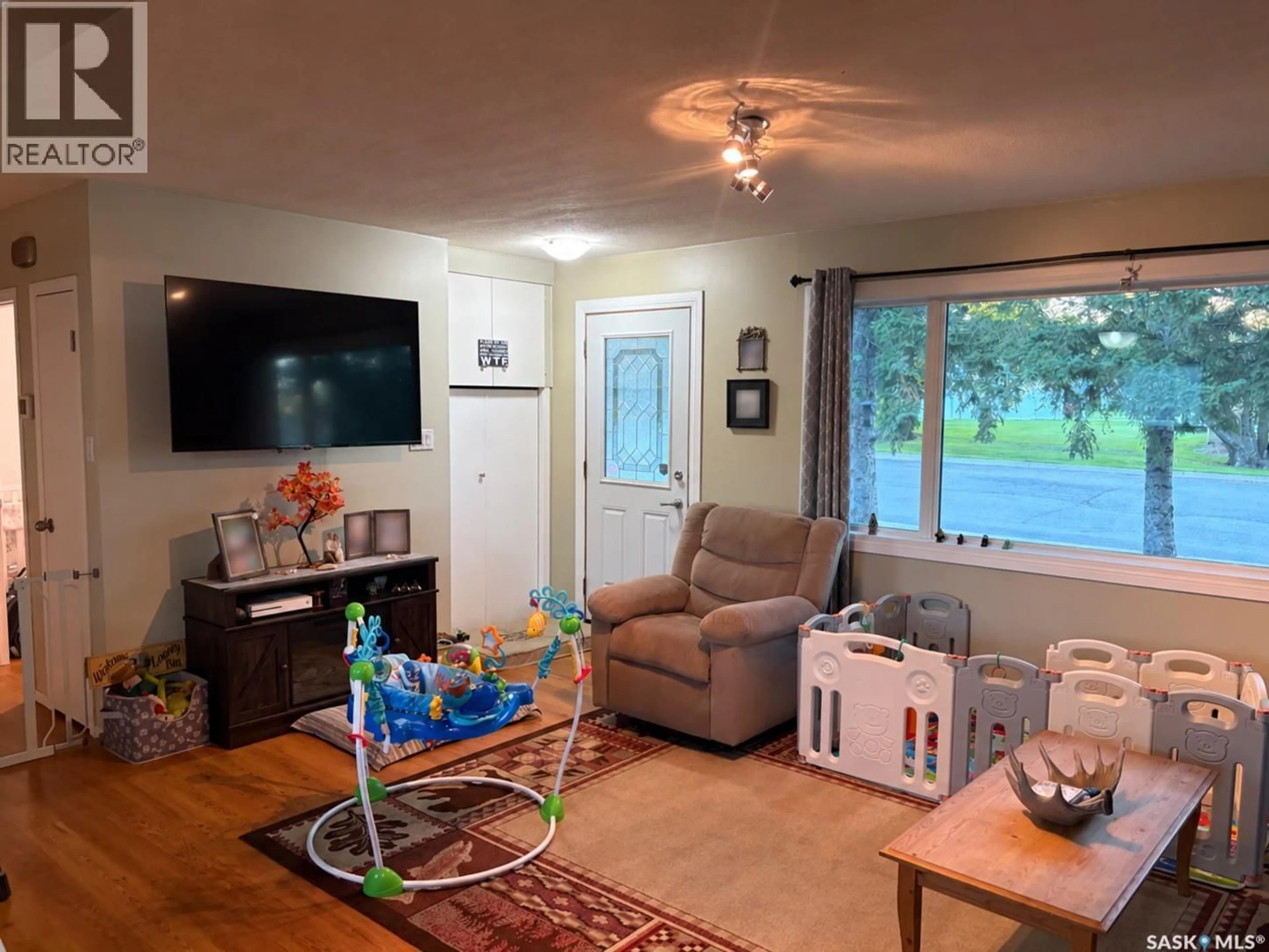Living room with furniture, unknown for 502 6TH STREET, Wynyard Saskatchewan S0A4T0