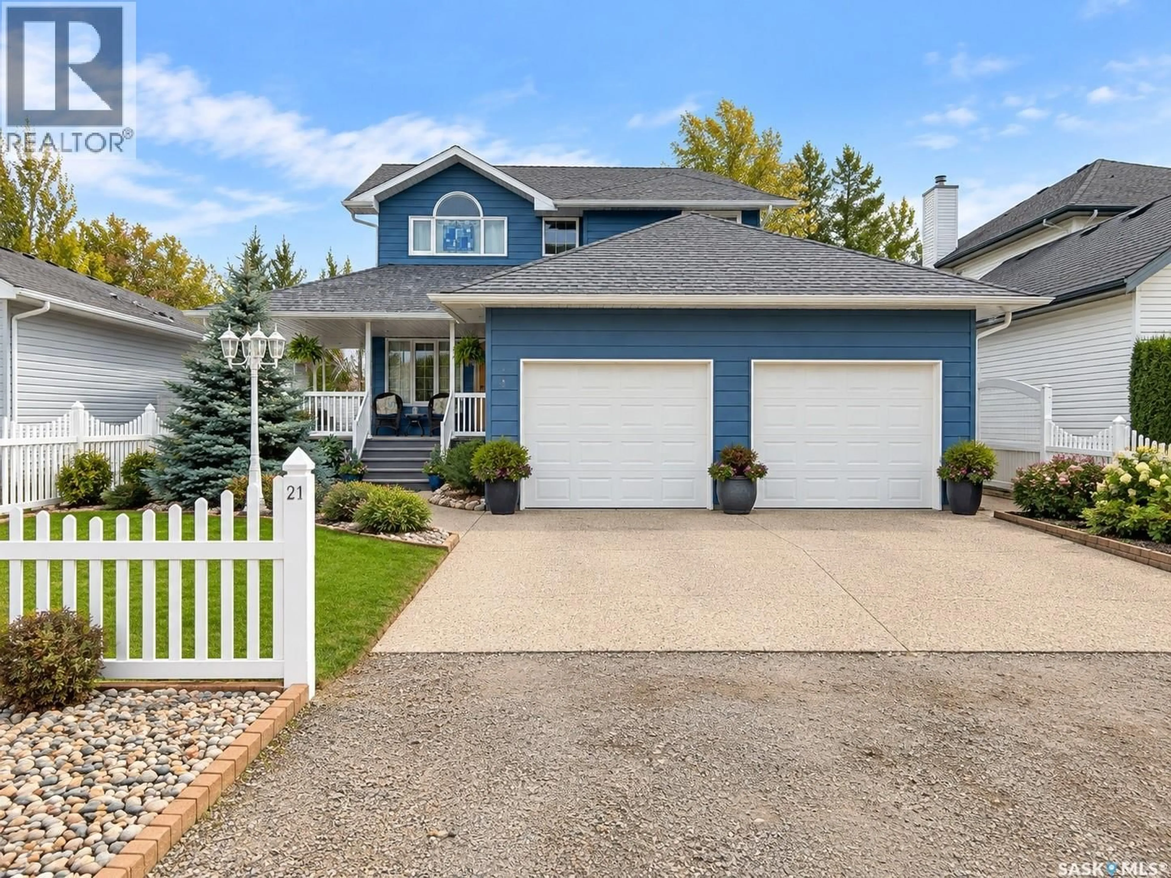 Home with vinyl exterior material, street for 21 WILFRED STREET, Grand Coulee Saskatchewan S4M0A3
