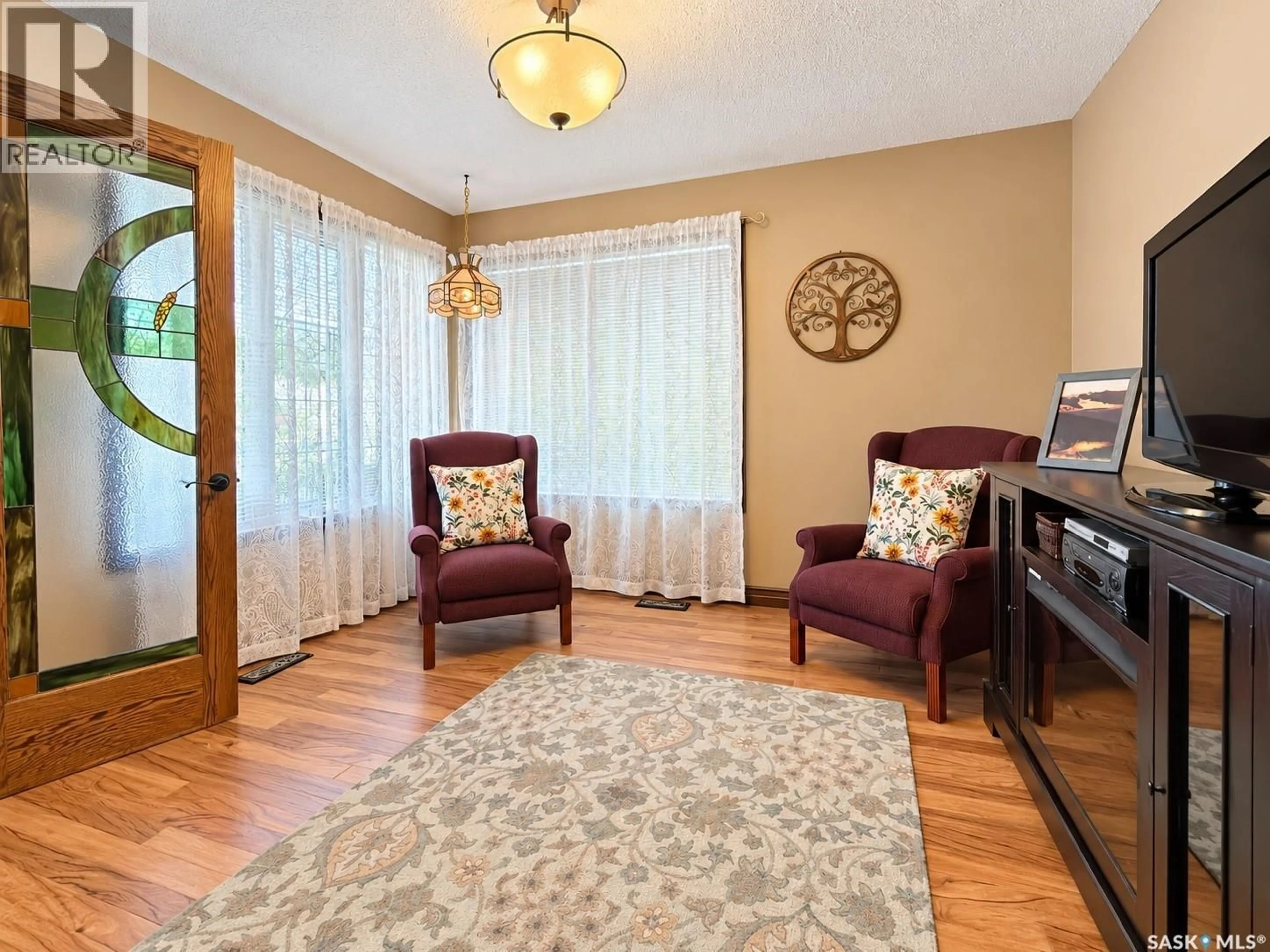 Living room with furniture, unknown for 21 WILFRED STREET, Grand Coulee Saskatchewan S4M0A3