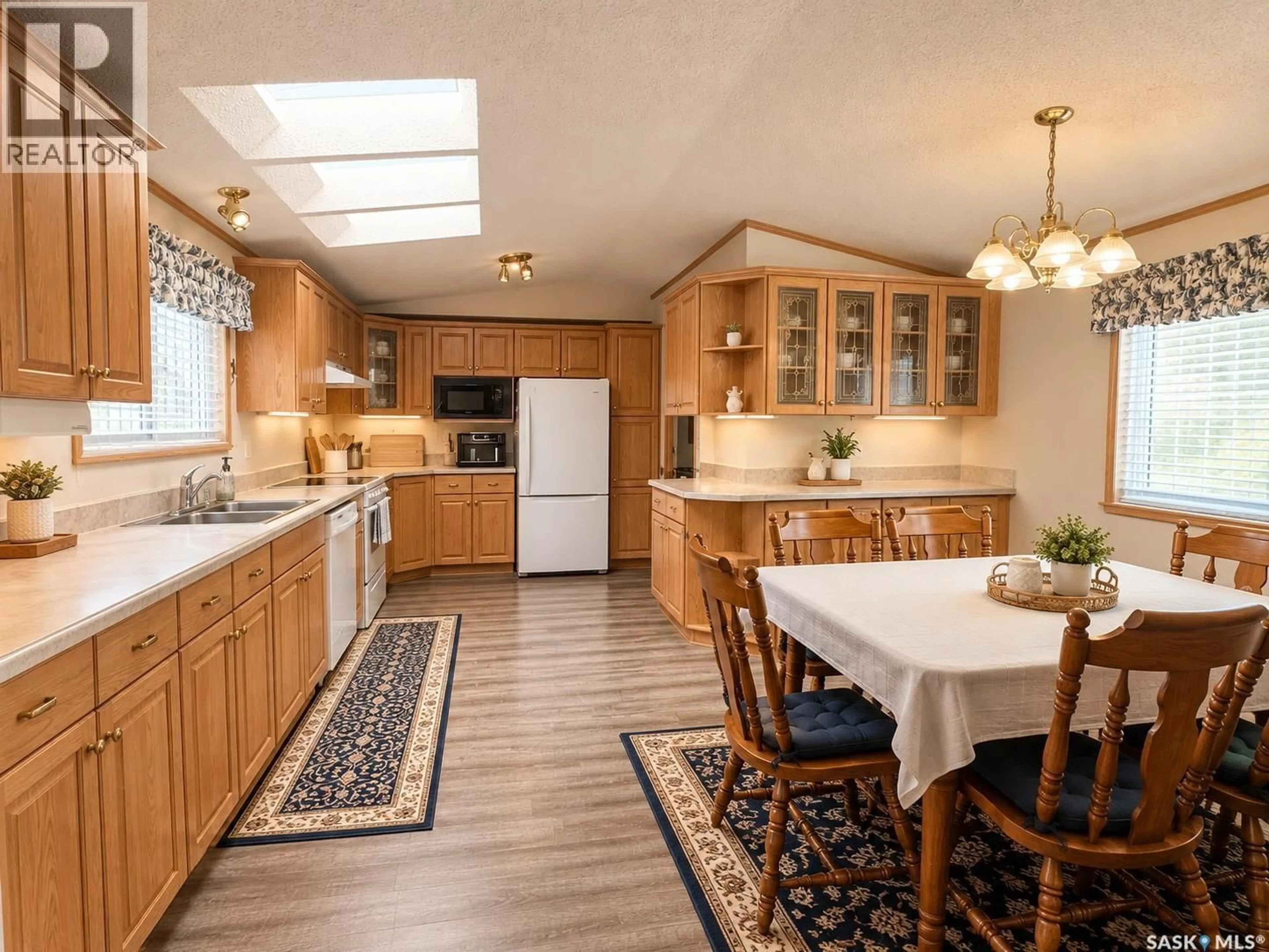 Open concept kitchen, unknown for E - 518 MARCH AVENUE, Langenburg Saskatchewan S0A2A0
