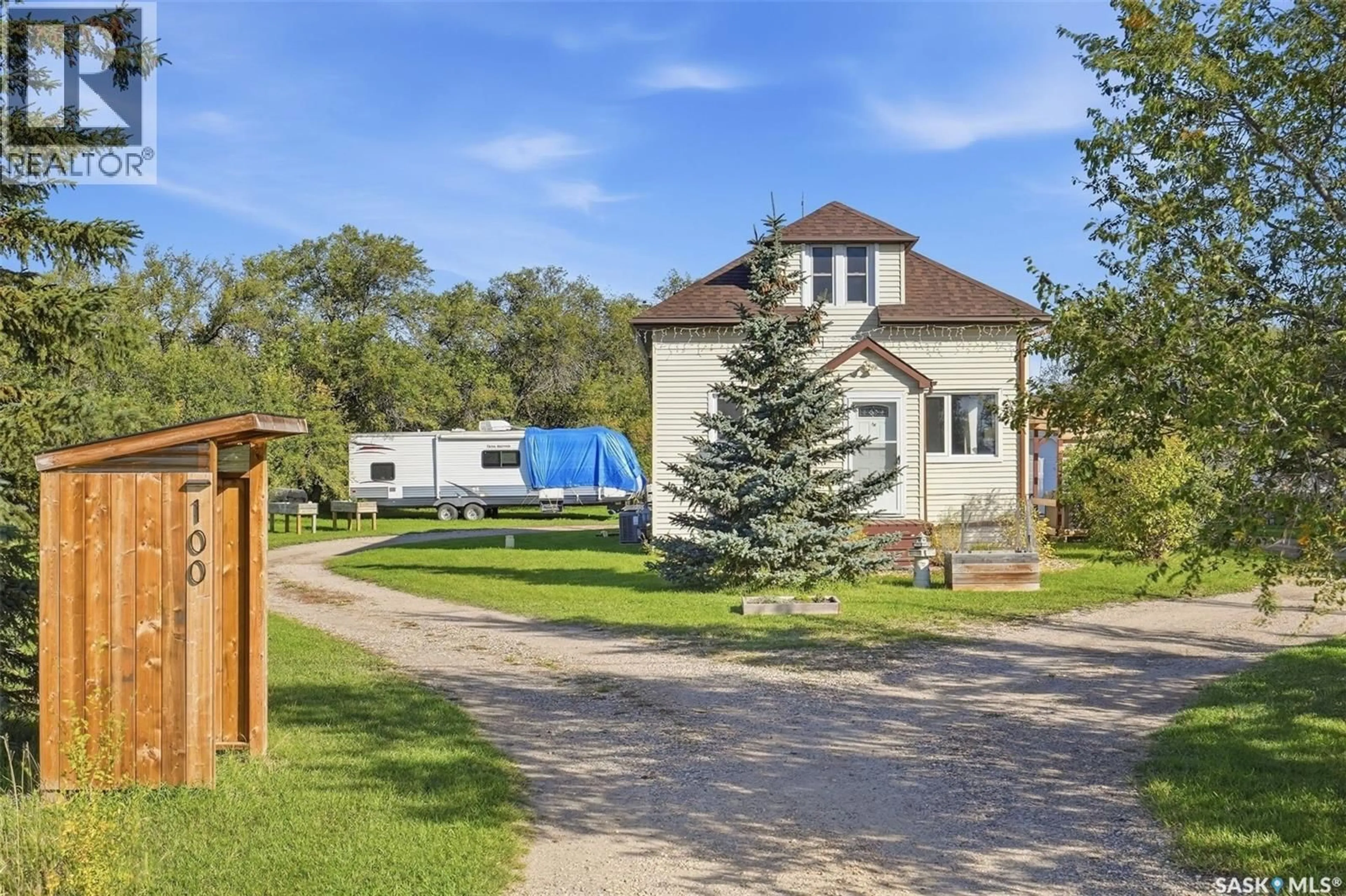 A pic from outside/outdoor area/front of a property/back of a property/a pic from drone, street for 100 PIKE LAKE ROAD, Vanscoy Saskatchewan S0L3J0