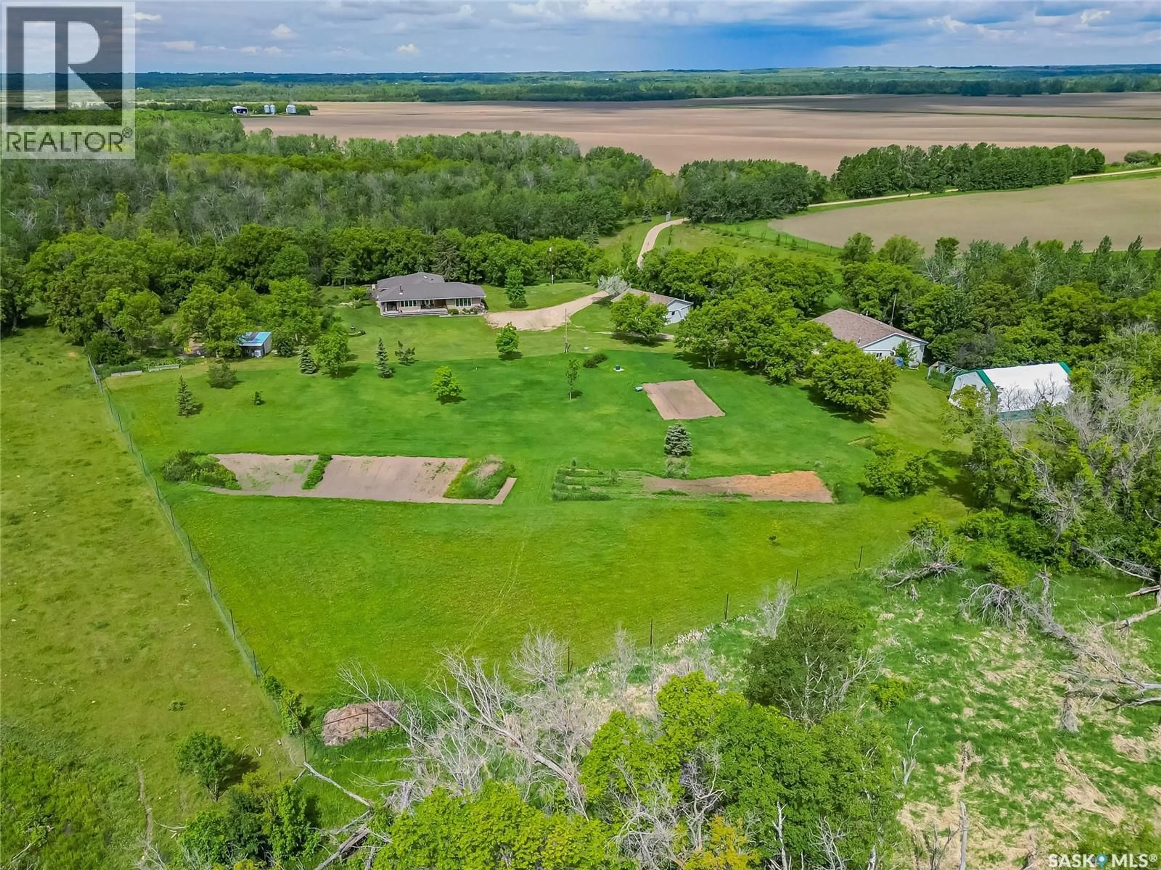 A pic from outside/outdoor area/front of a property/back of a property/a pic from drone, water/lake/river/ocean view for Fung ACREAGE, Dundurn Rm No. 314 Saskatchewan S7K1M2