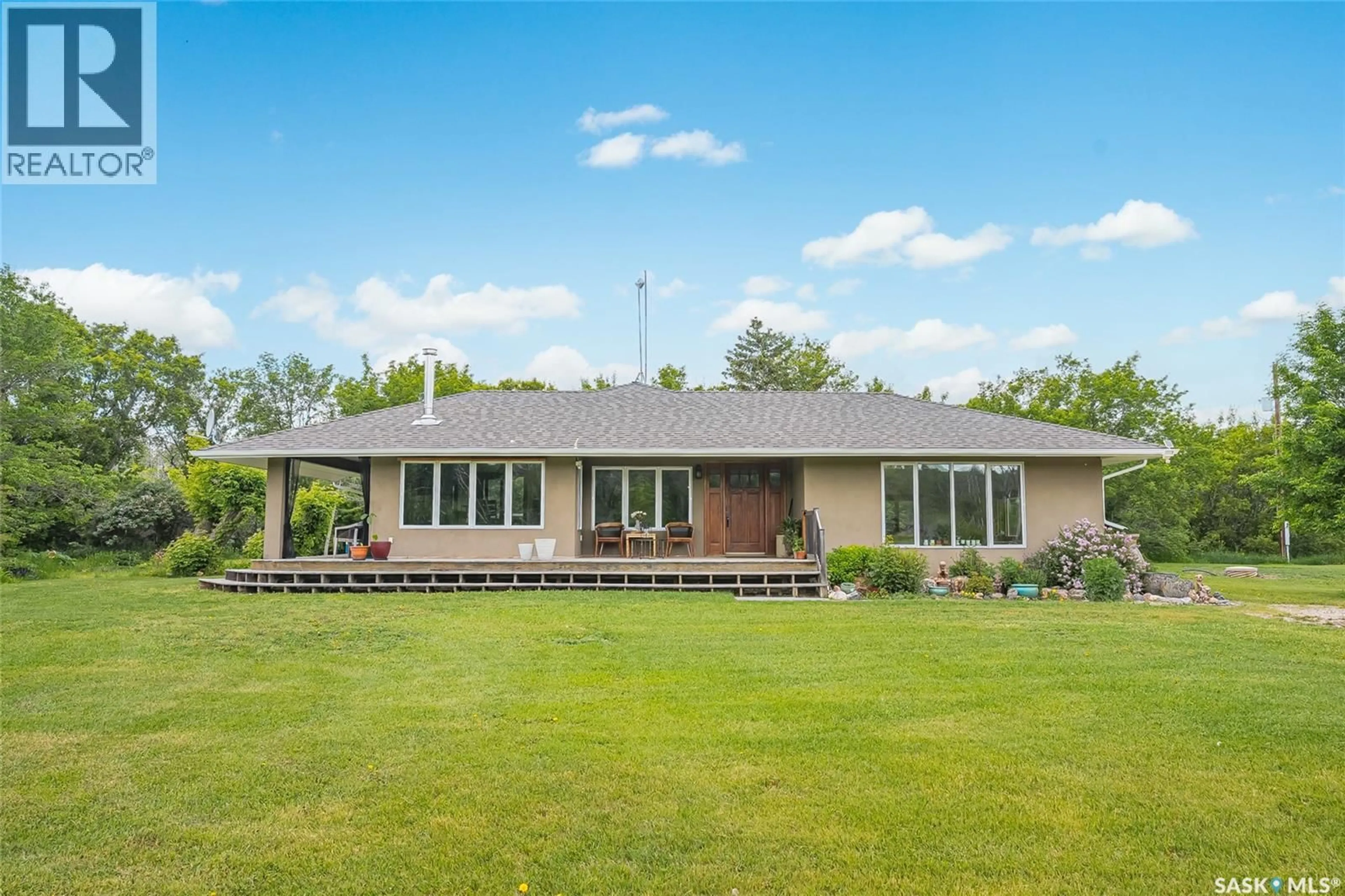 A pic from outside/outdoor area/front of a property/back of a property/a pic from drone, building for Fung ACREAGE, Dundurn Rm No. 314 Saskatchewan S7K1M2