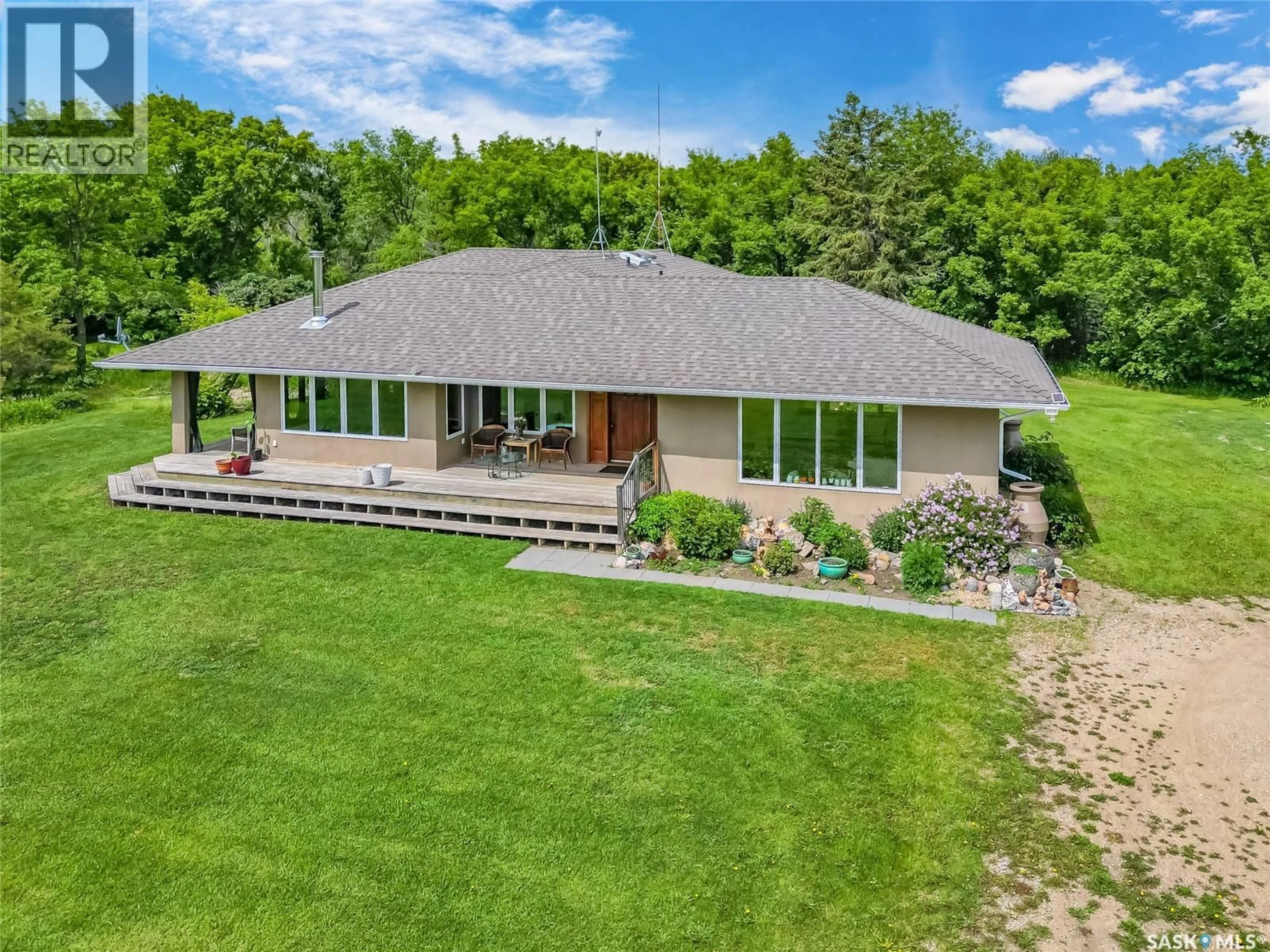 A pic from outside/outdoor area/front of a property/back of a property/a pic from drone, water/lake/river/ocean view for Fung ACREAGE, Dundurn Rm No. 314 Saskatchewan S7K1M2