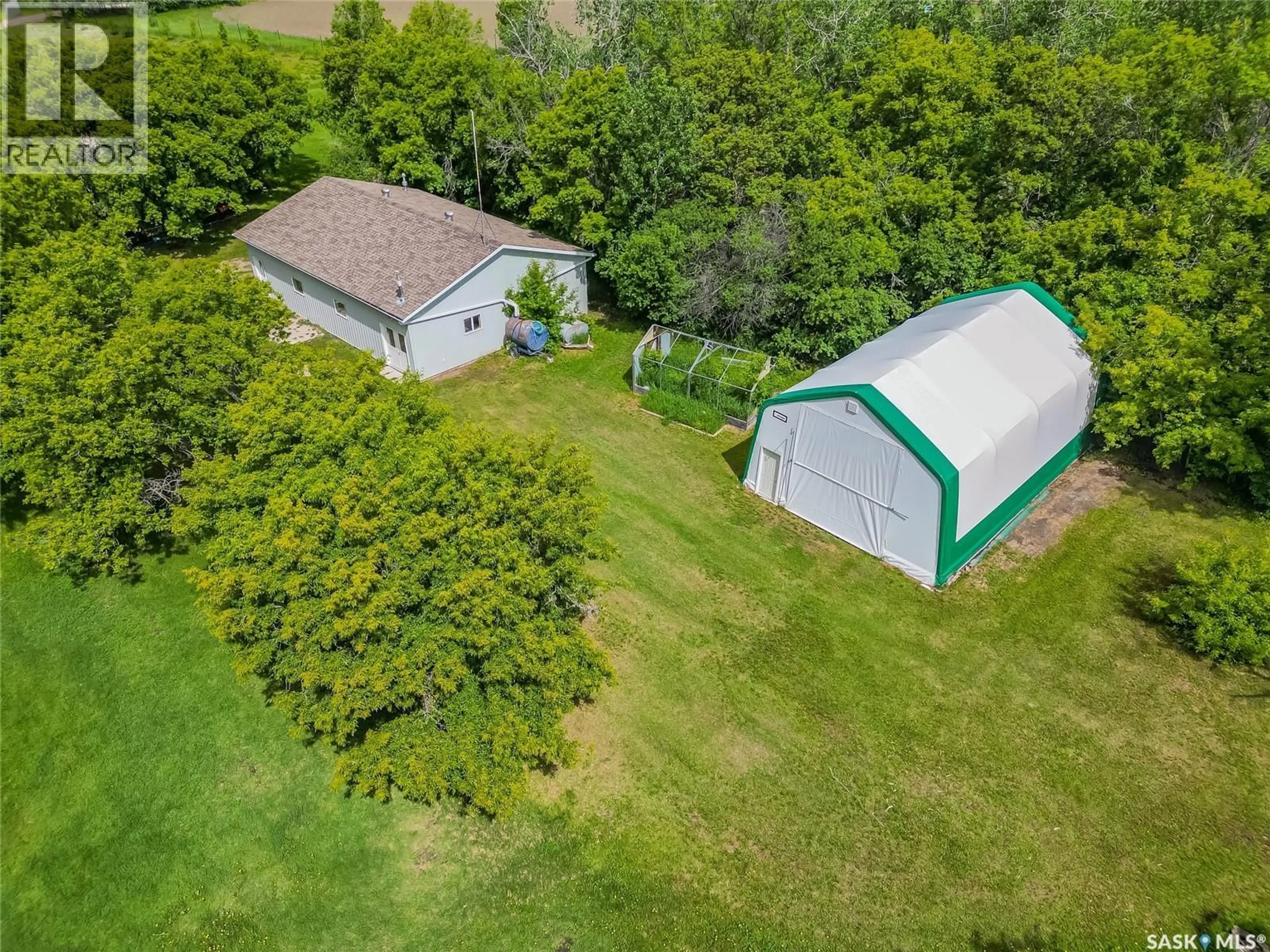 A pic from outside/outdoor area/front of a property/back of a property/a pic from drone, unknown for Fung ACREAGE, Dundurn Rm No. 314 Saskatchewan S7K1M2