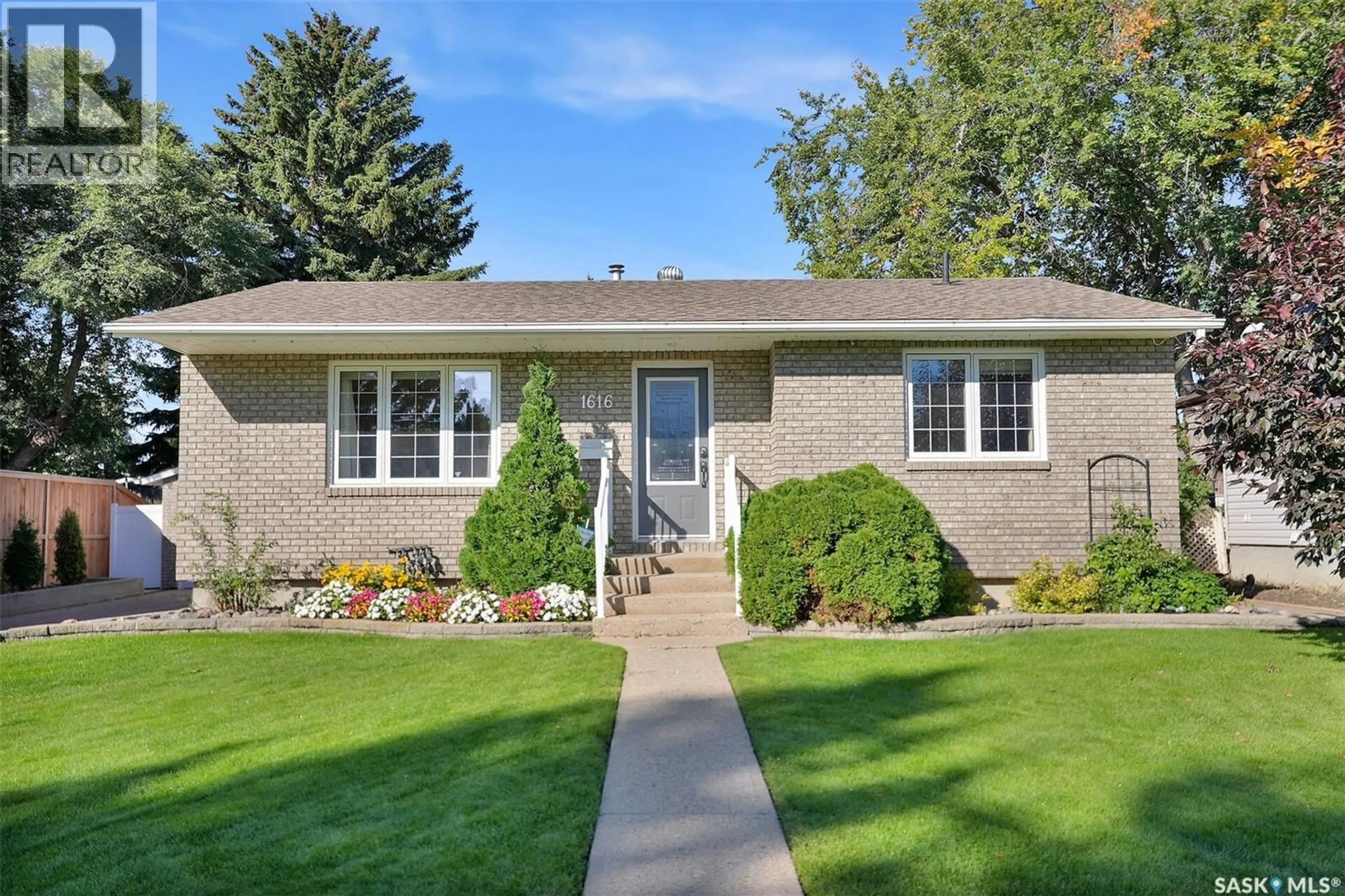 Home with brick exterior material, street for 1616 MARSHAL CRESCENT, Moose Jaw Saskatchewan S6H3G6
