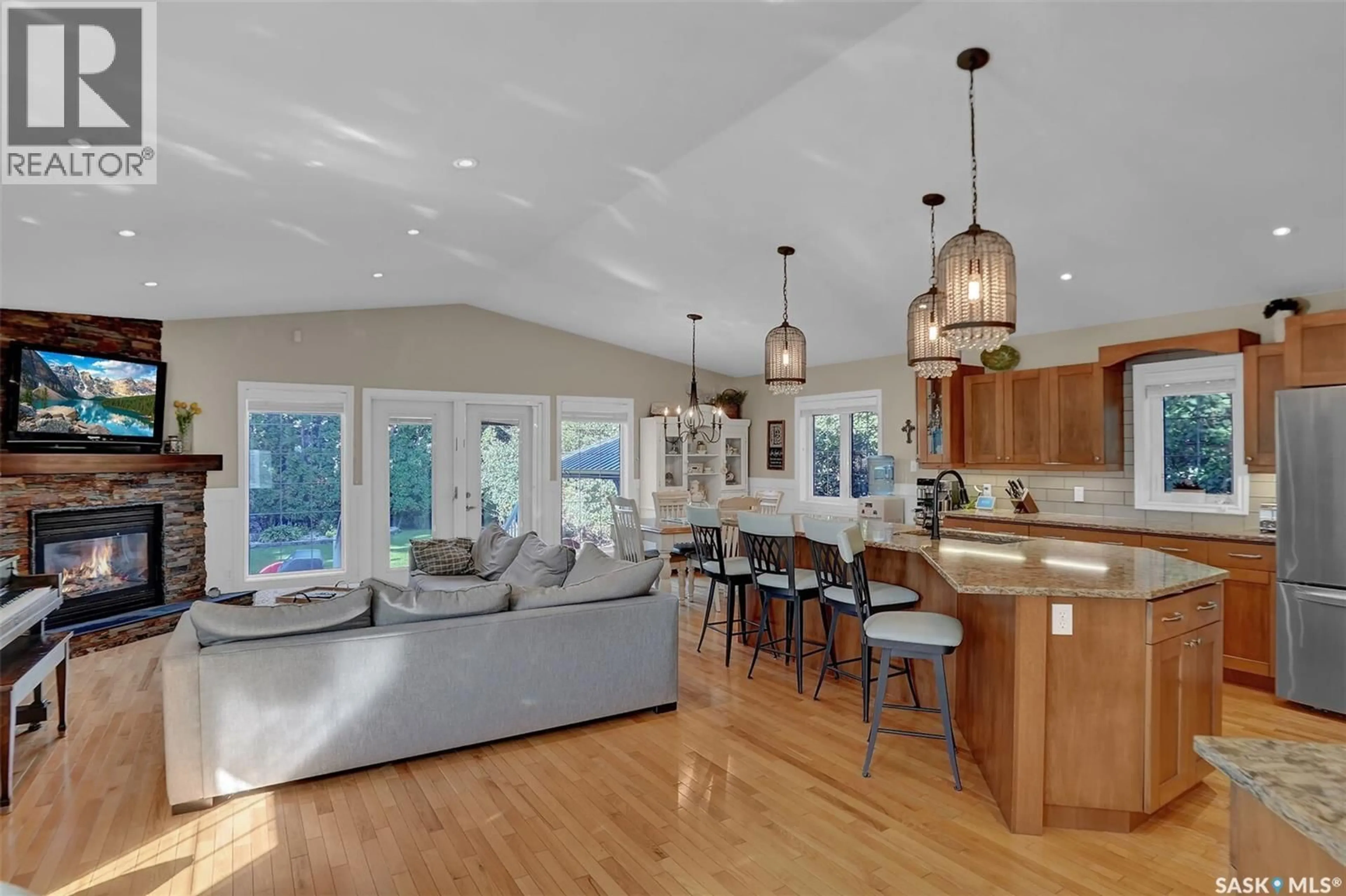 Open concept kitchen, wood/laminate floor for 1616 MARSHAL CRESCENT, Moose Jaw Saskatchewan S6H3G6