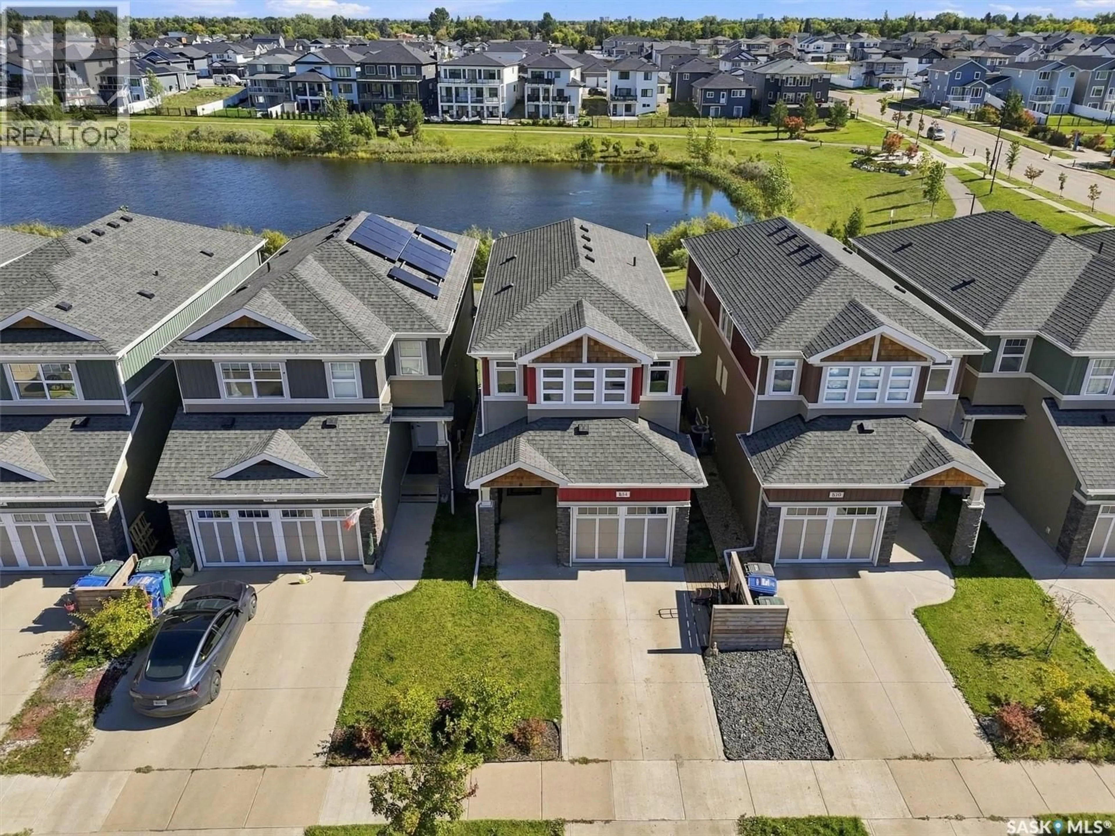 A pic from outside/outdoor area/front of a property/back of a property/a pic from drone, water/lake/river/ocean view for 814 KENSINGTON BOULEVARD, Saskatoon Saskatchewan S7L6C6