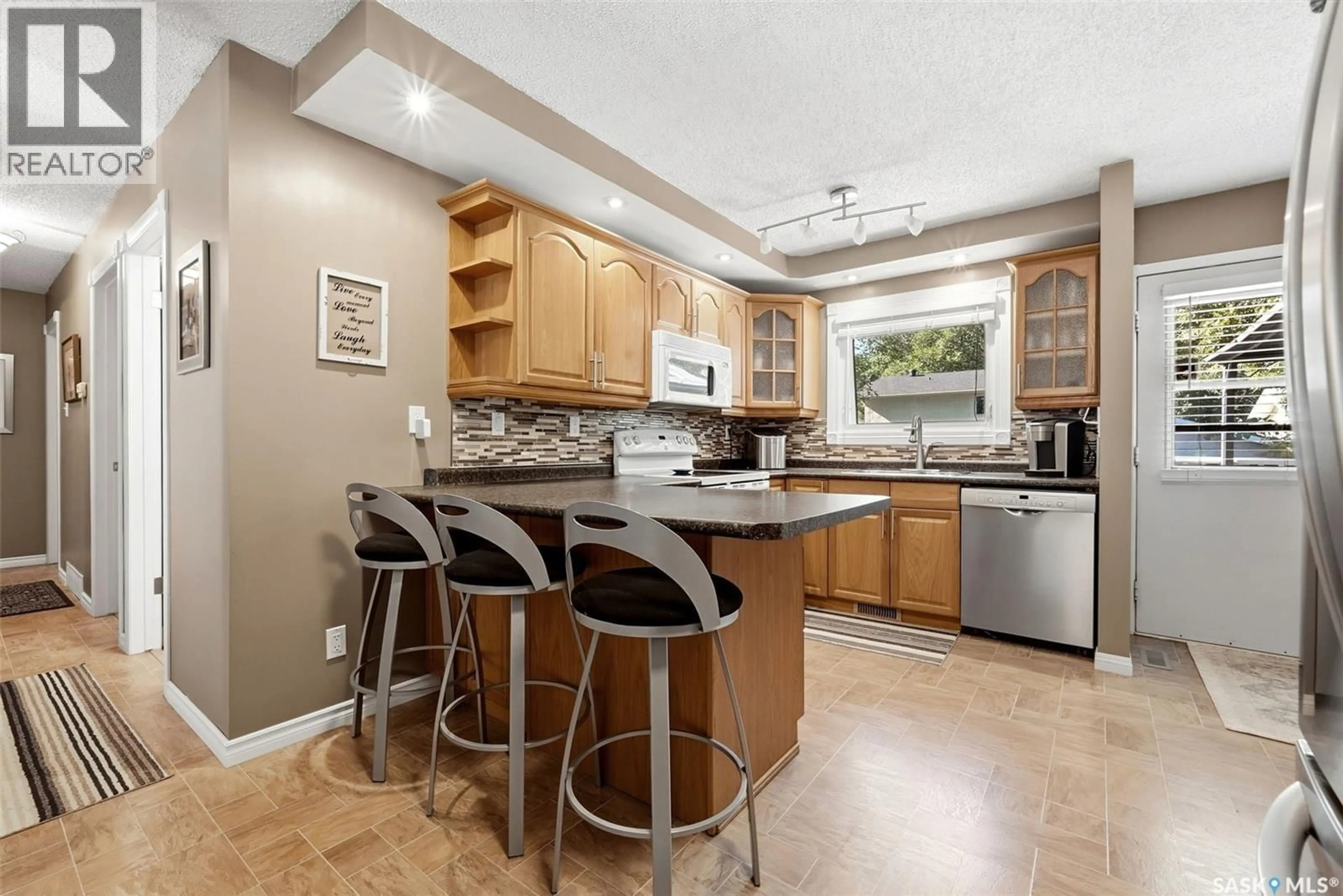 Open concept kitchen, ceramic/tile floor for 210 WINDFIELD ROAD, Regina Saskatchewan S4V0K3
