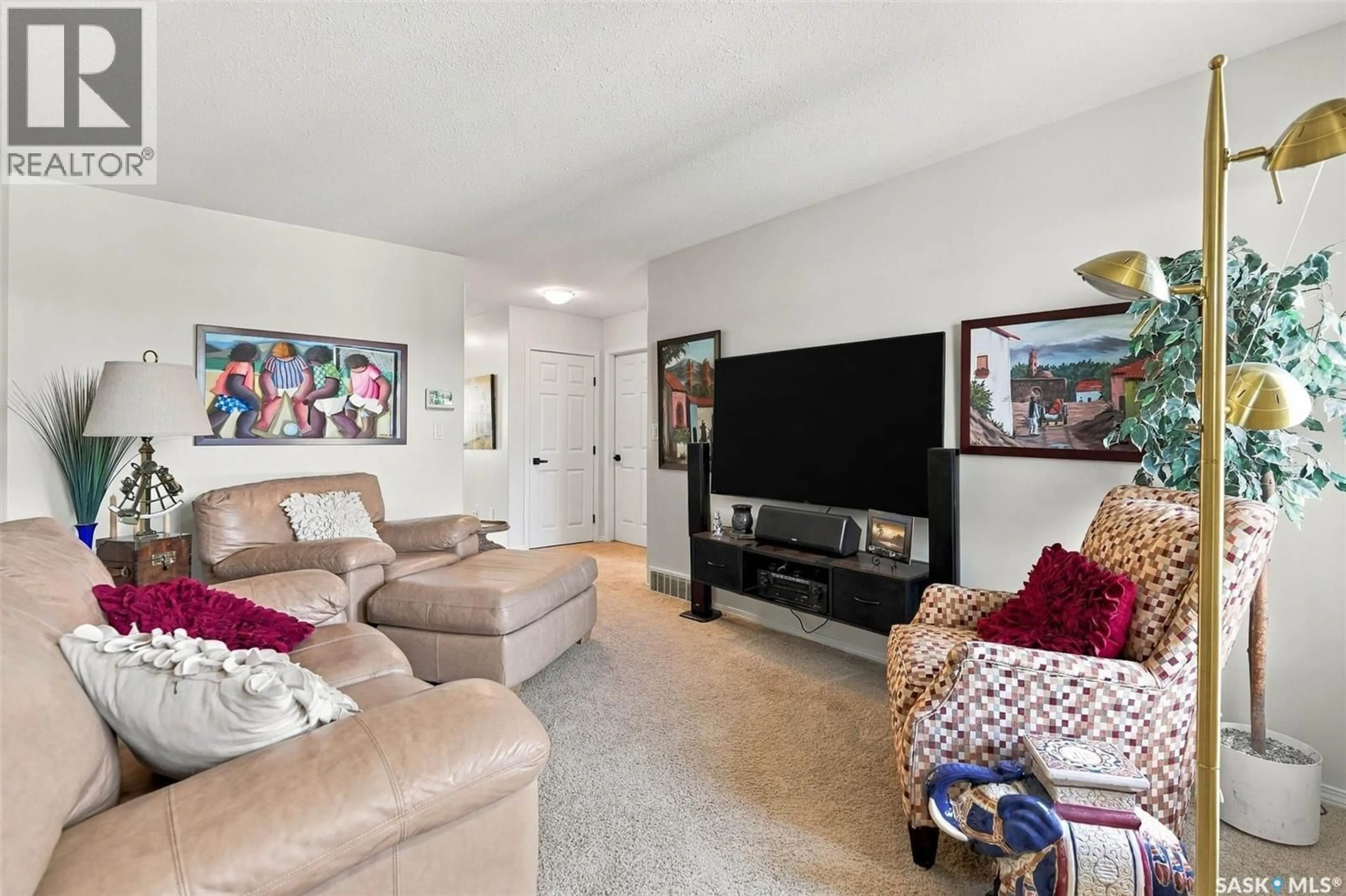 Living room with furniture, unknown for 219 SOUTH FRONT STREET, Pense Saskatchewan S0G3W0