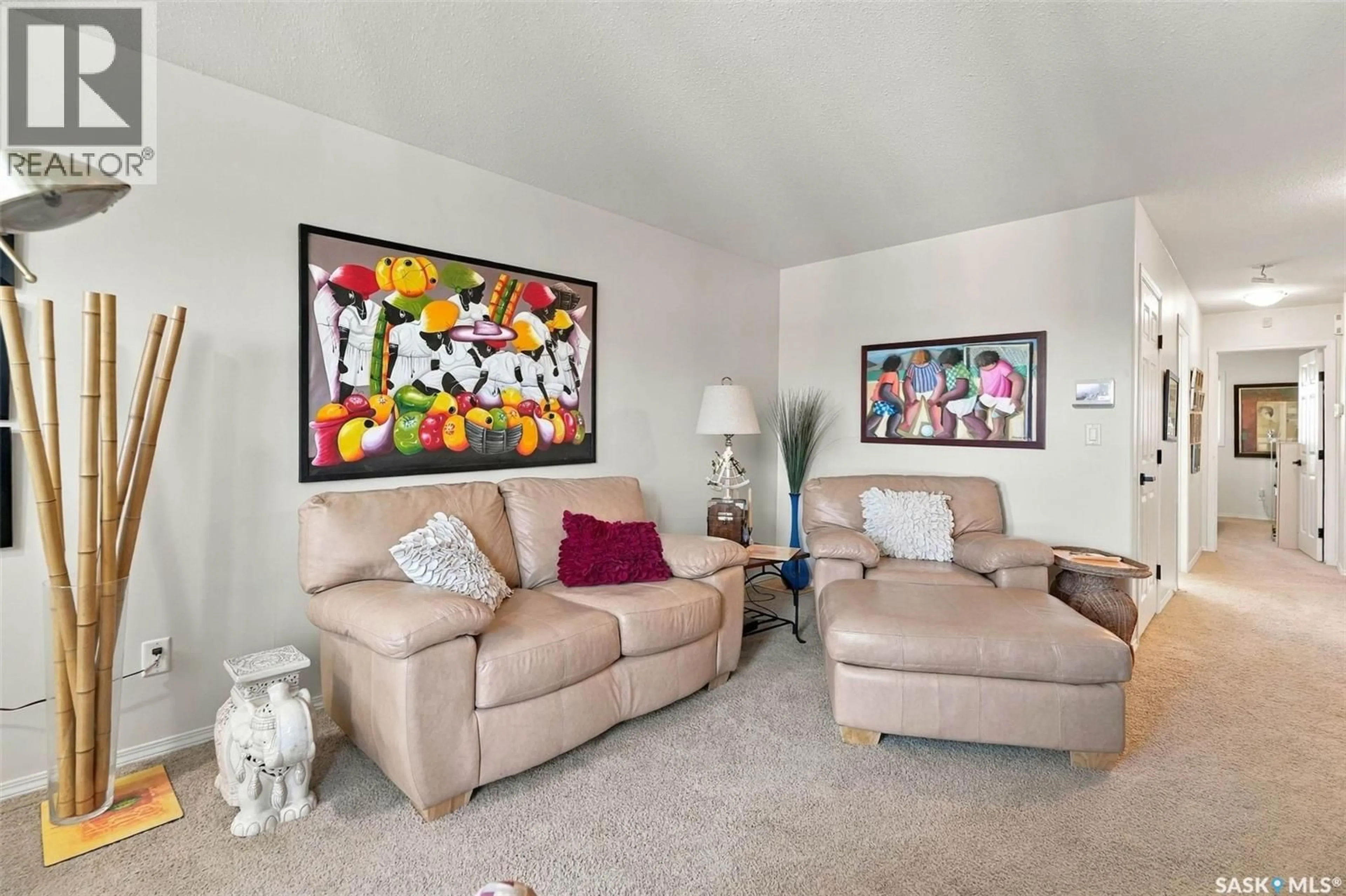 Living room with furniture, carpet floor for 219 SOUTH FRONT STREET, Pense Saskatchewan S0G3W0