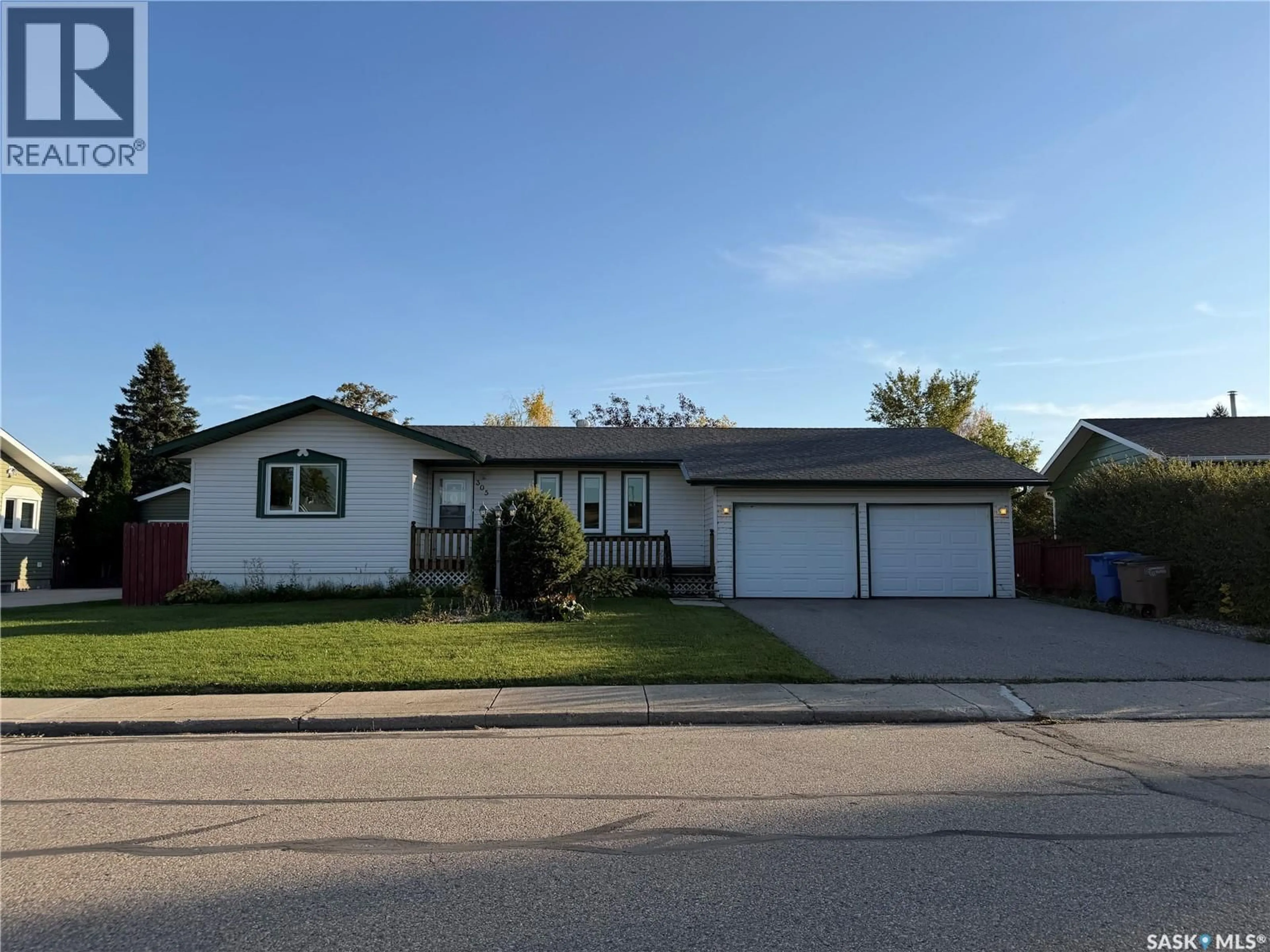 Home with vinyl exterior material, street for 305 CHURCHILL DRIVE, Melfort Saskatchewan S0E1A0