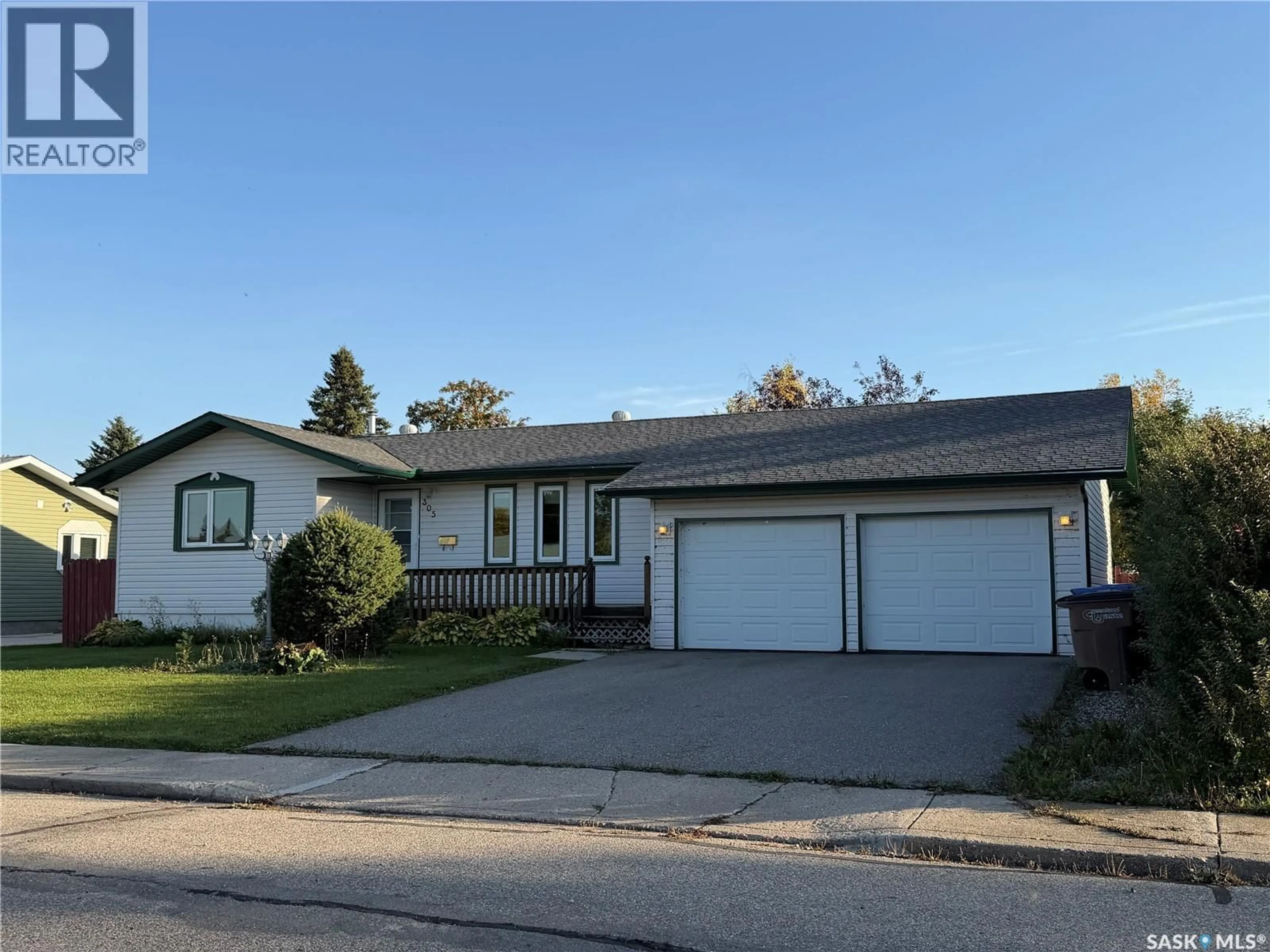 Home with vinyl exterior material, street for 305 CHURCHILL DRIVE, Melfort Saskatchewan S0E1A0